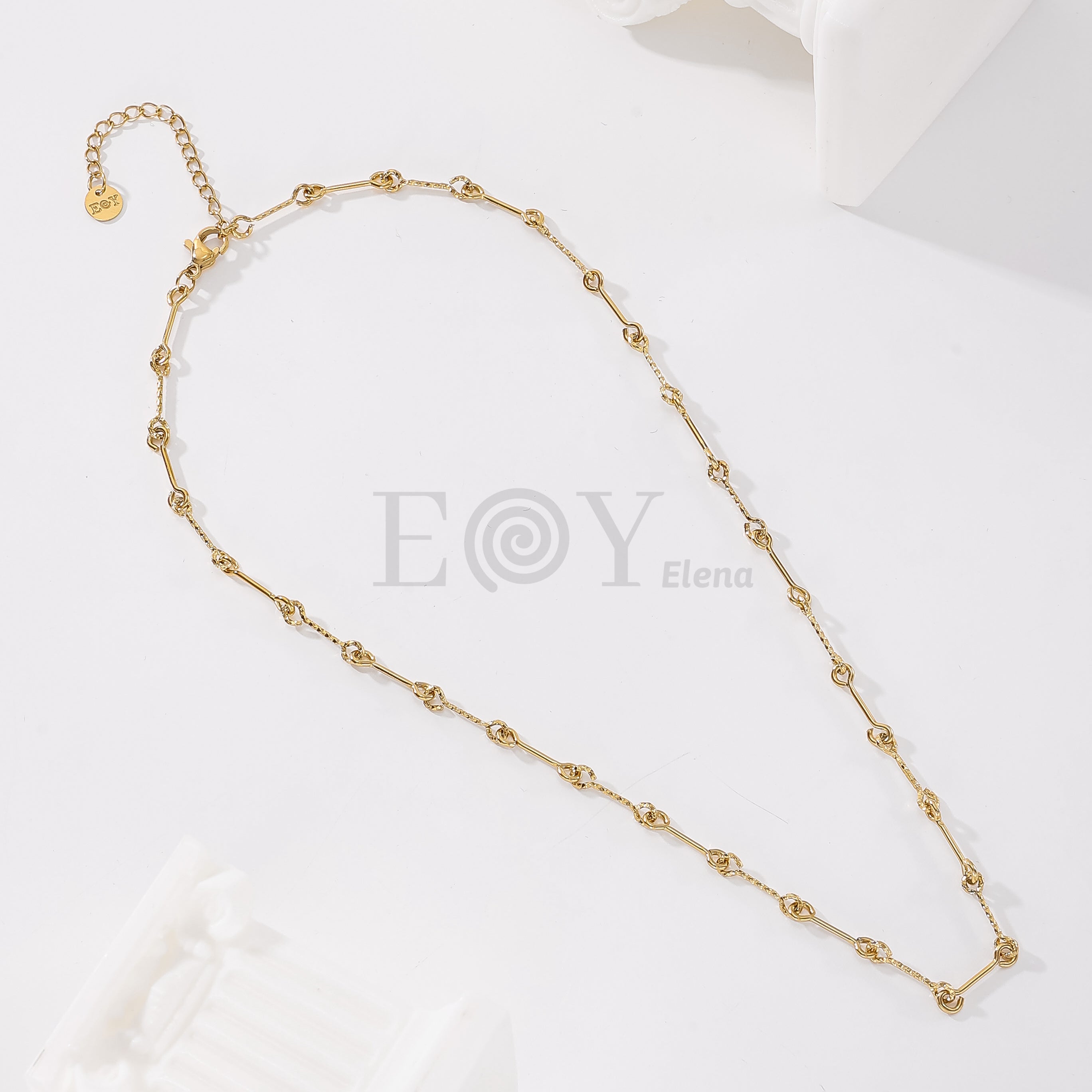 Collar aros cruzados