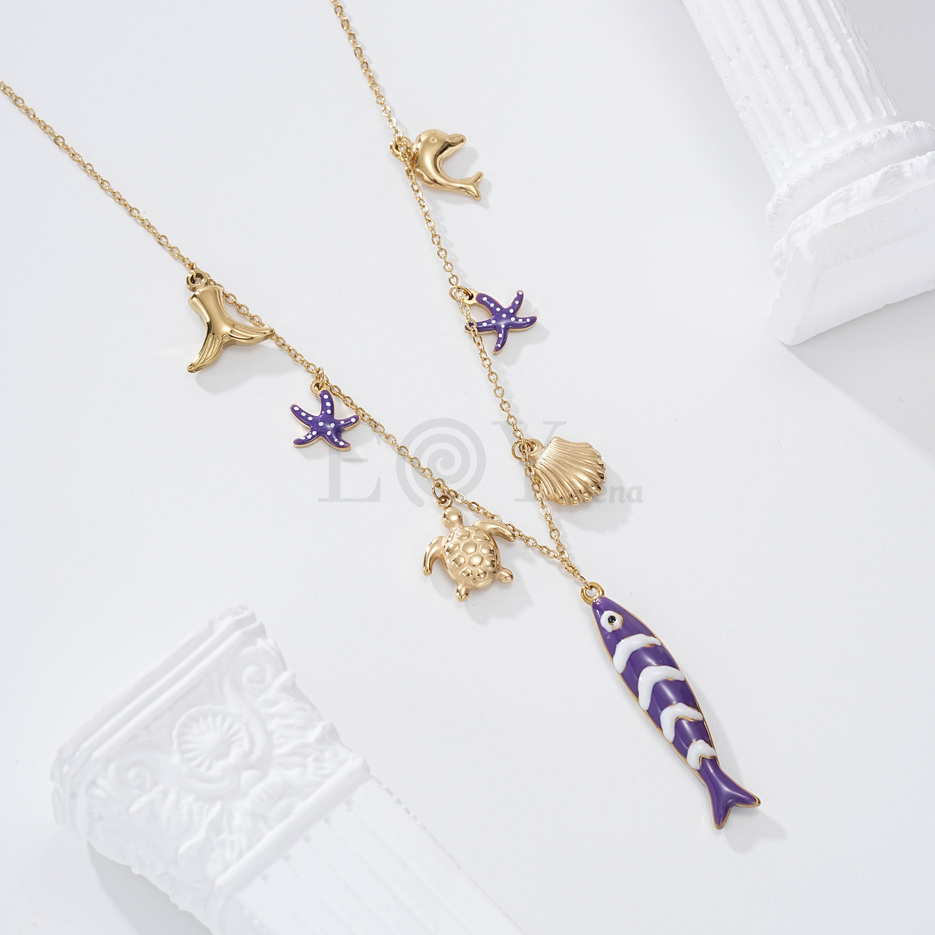 Collares con pez color y charms marinos acero