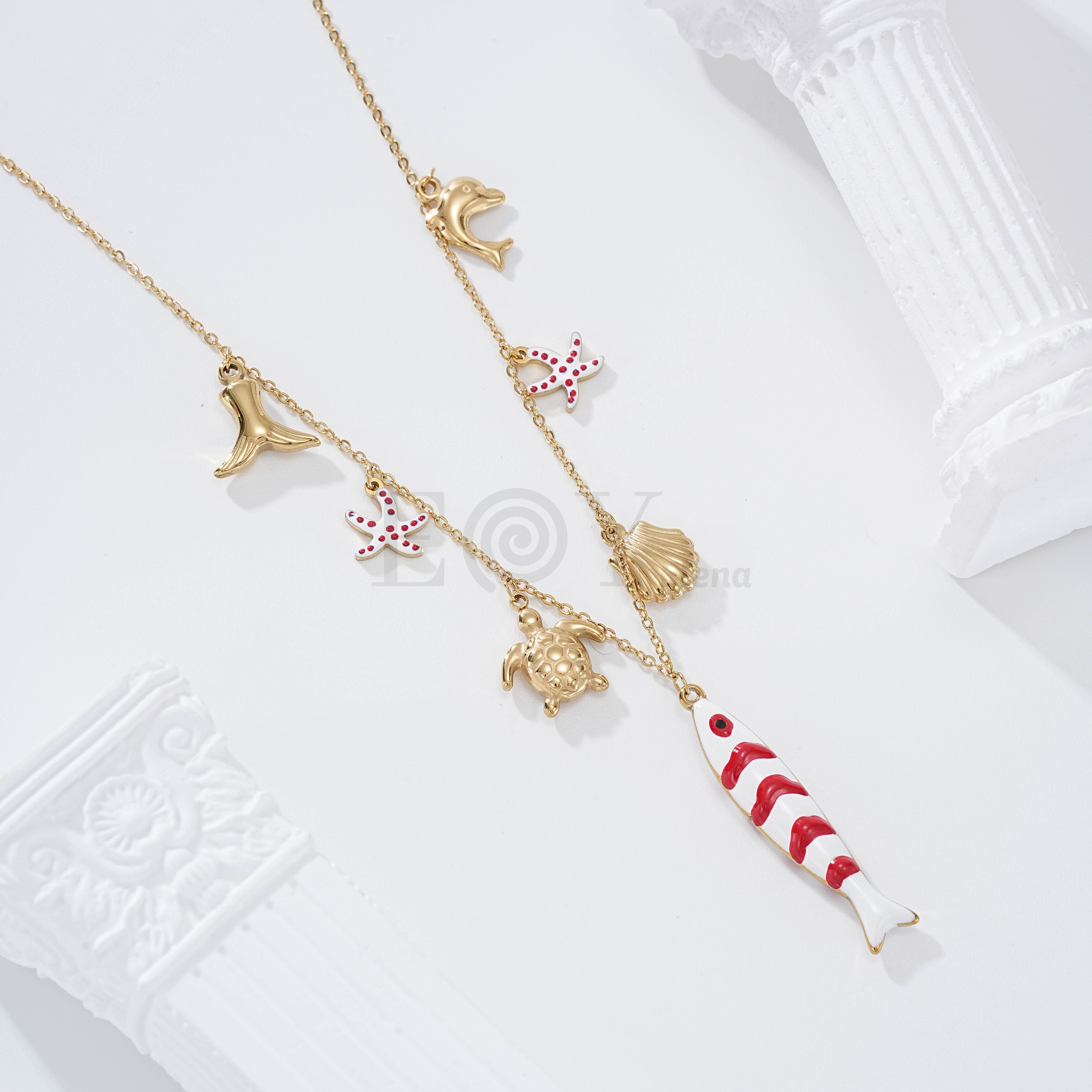 Collares con pez color y charms marinos acero