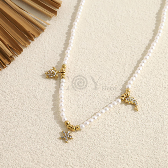 Collar perlas y estrella tortuga delfín