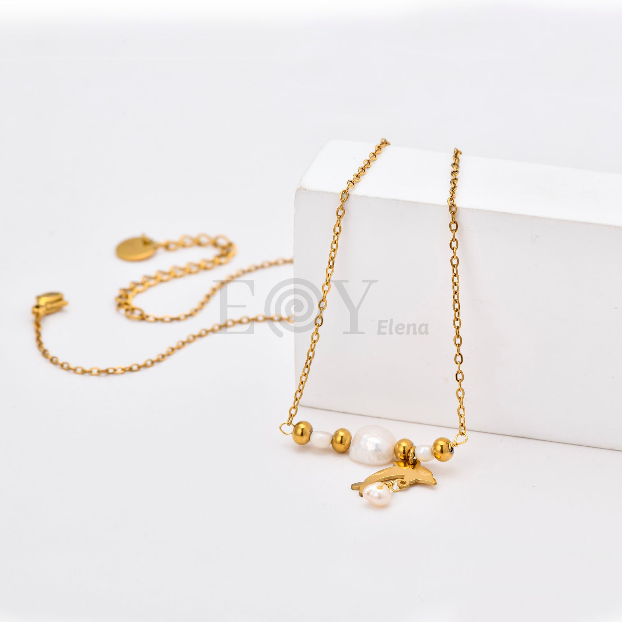 Collar Delfín y Perla de Acero Dorado
