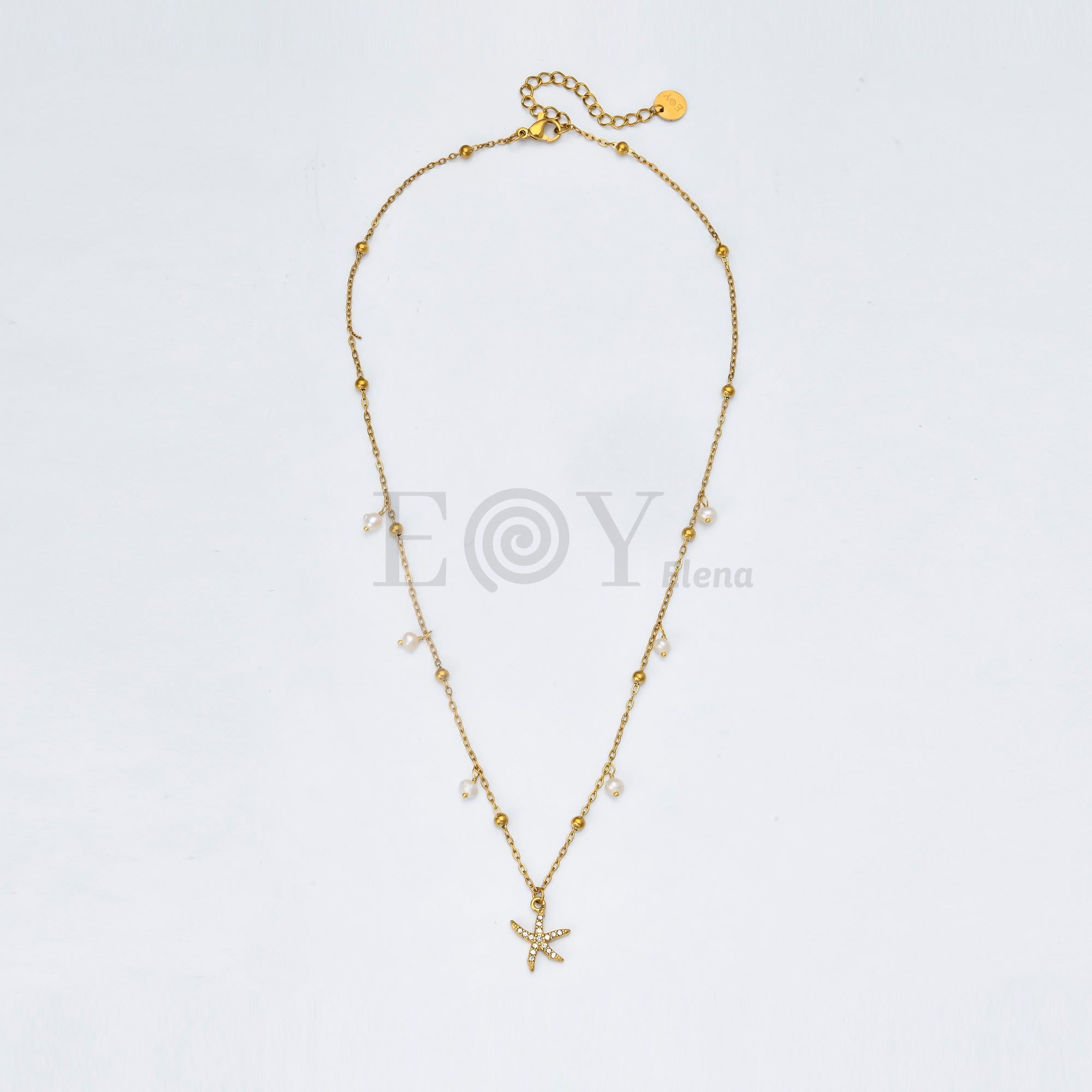 Collar Estrella de Mar con Circonitas y Perlas de Acero Dorado