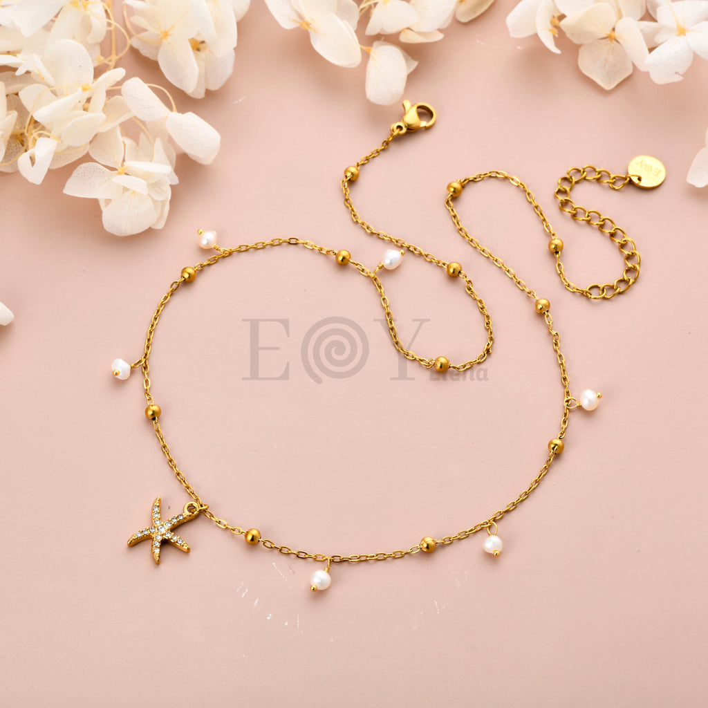 Collar Estrella de Mar con Circonitas y Perlas de Acero Dorado