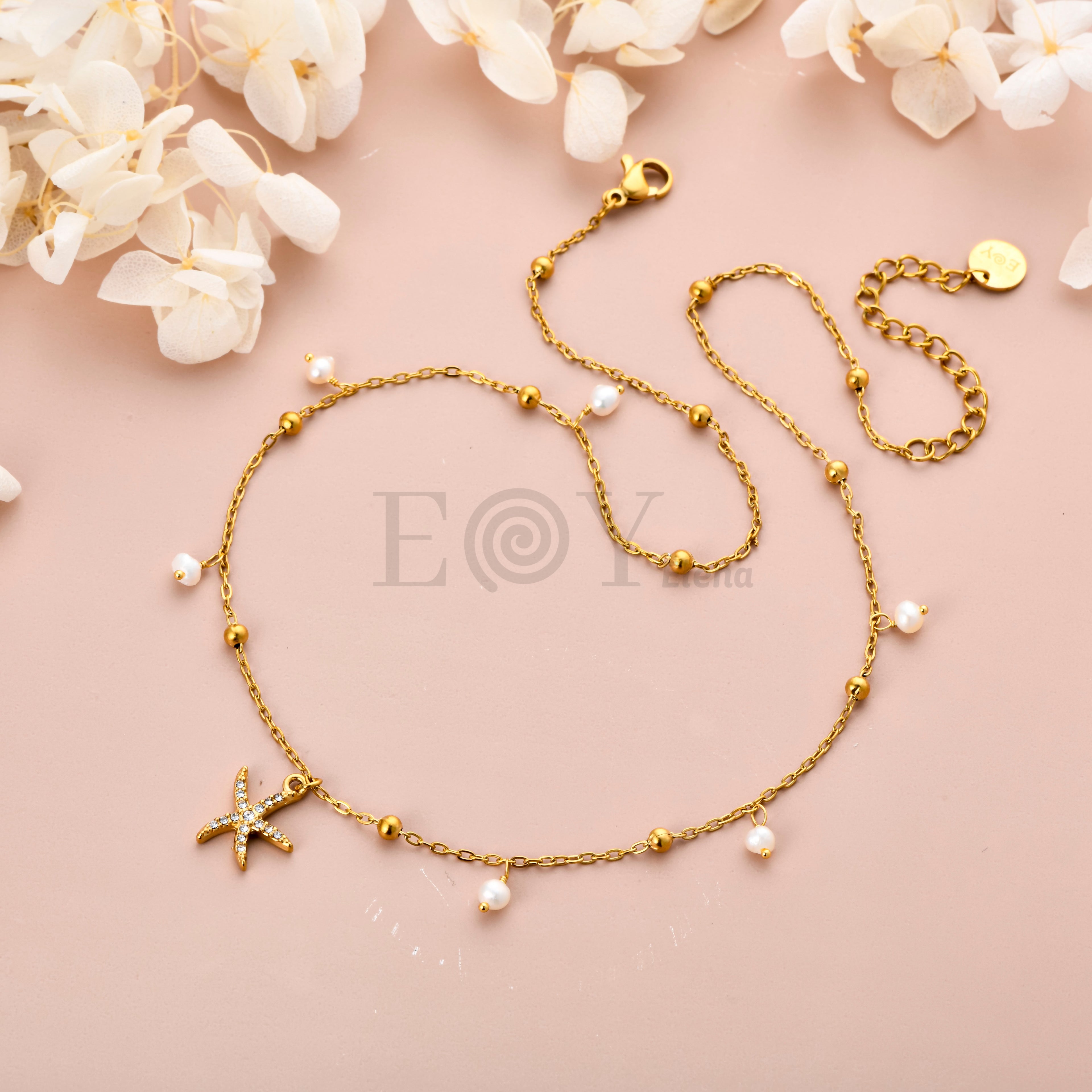 Collar Estrella de Mar con Circonitas y Perlas de Acero Dorado