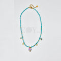 Collar bolitas turquesa y pez