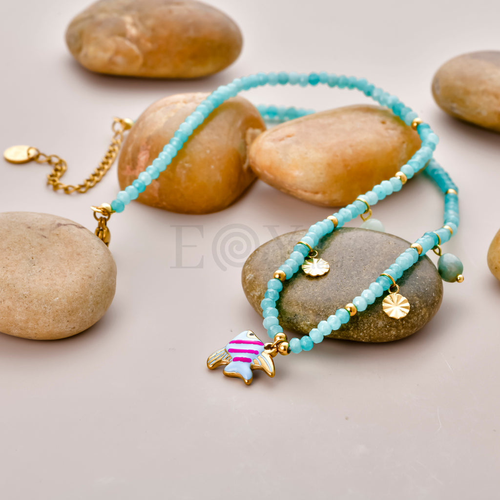 Collar bolitas turquesa y pez