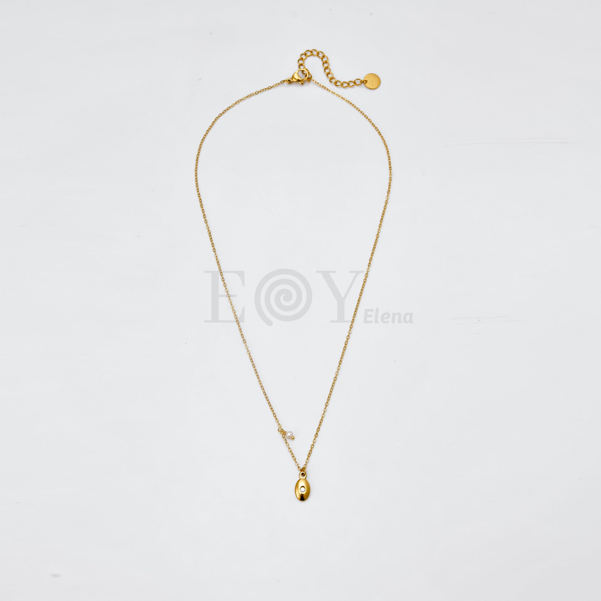 Collar con detalle circonita y perla