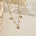 Collar con estrellas y piedras transparentes