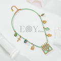 Collar con cuerda verde y pájaro