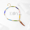 Collar colores y colmillo