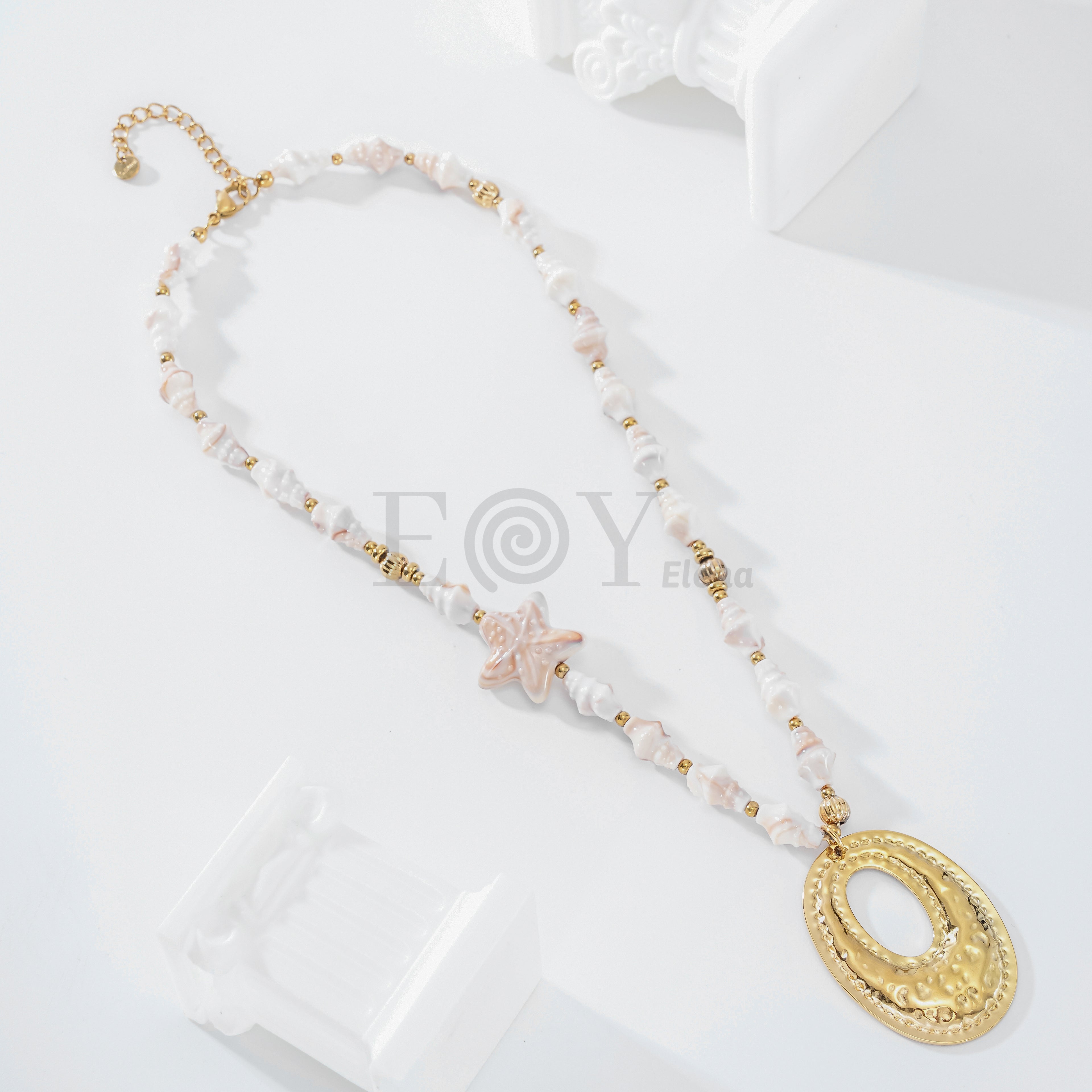 Collar conchas con aro central
