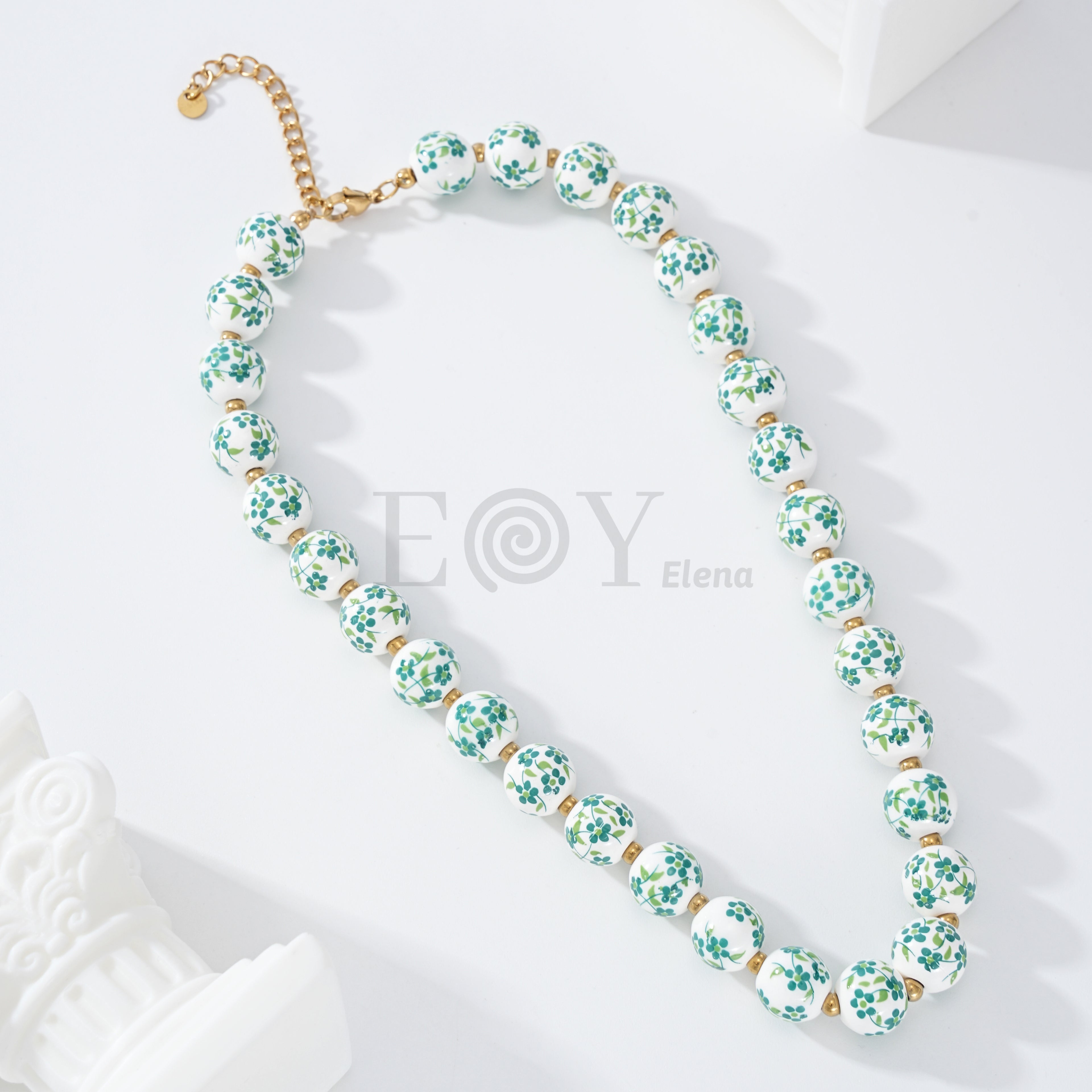 Collar bolas con flores
