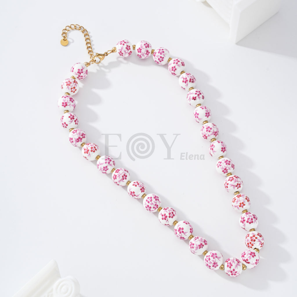 Collar bolas con flores