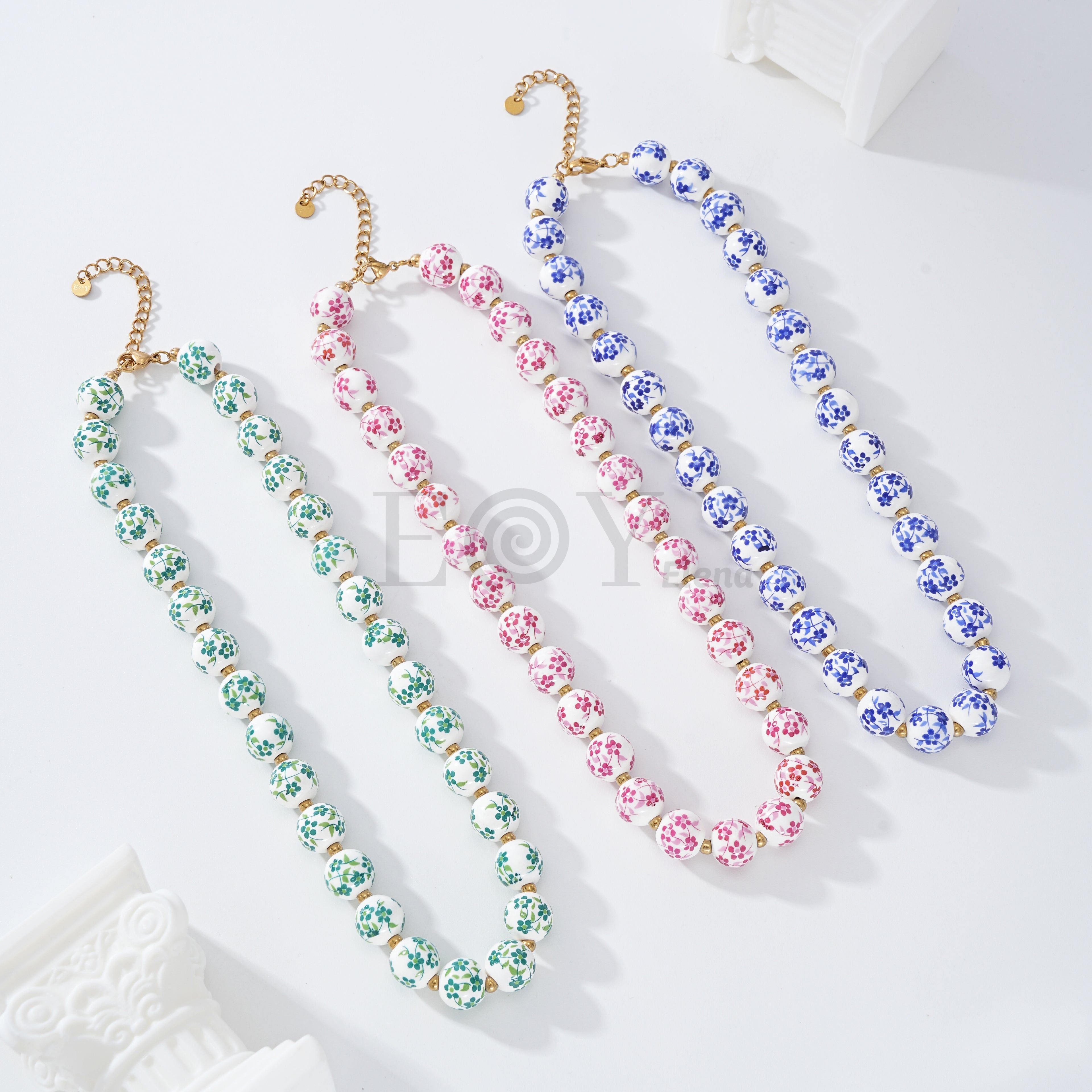 Collar bolas con flores