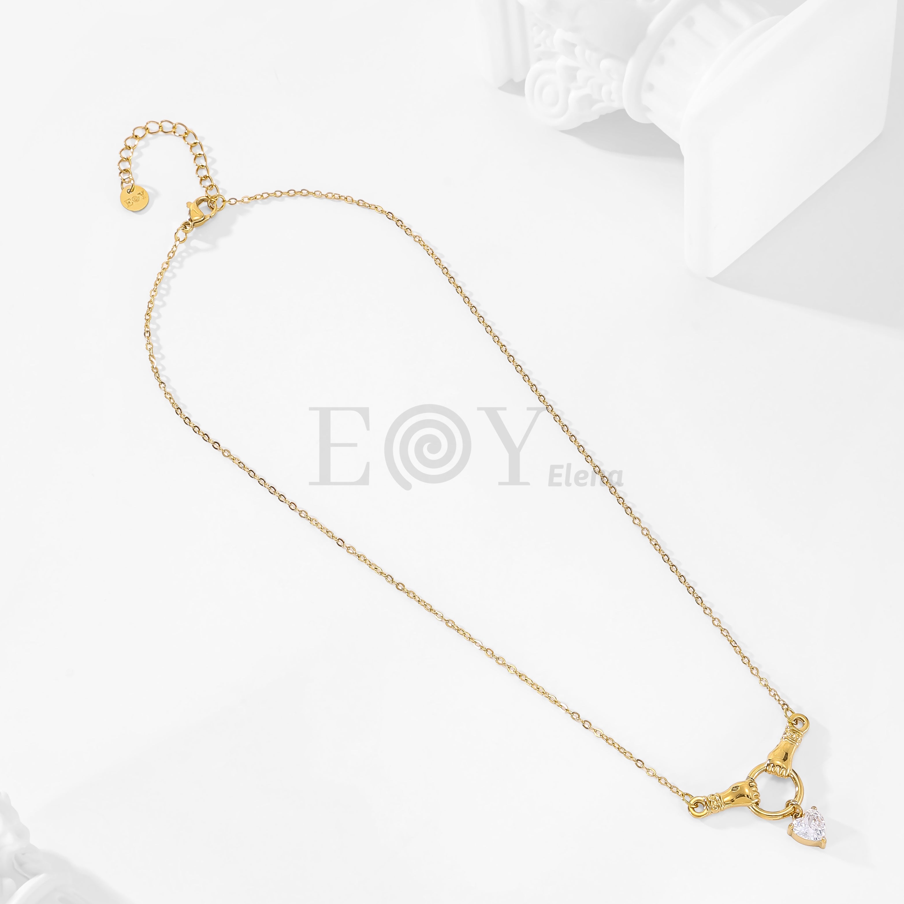 Collar manos y corazón circonita