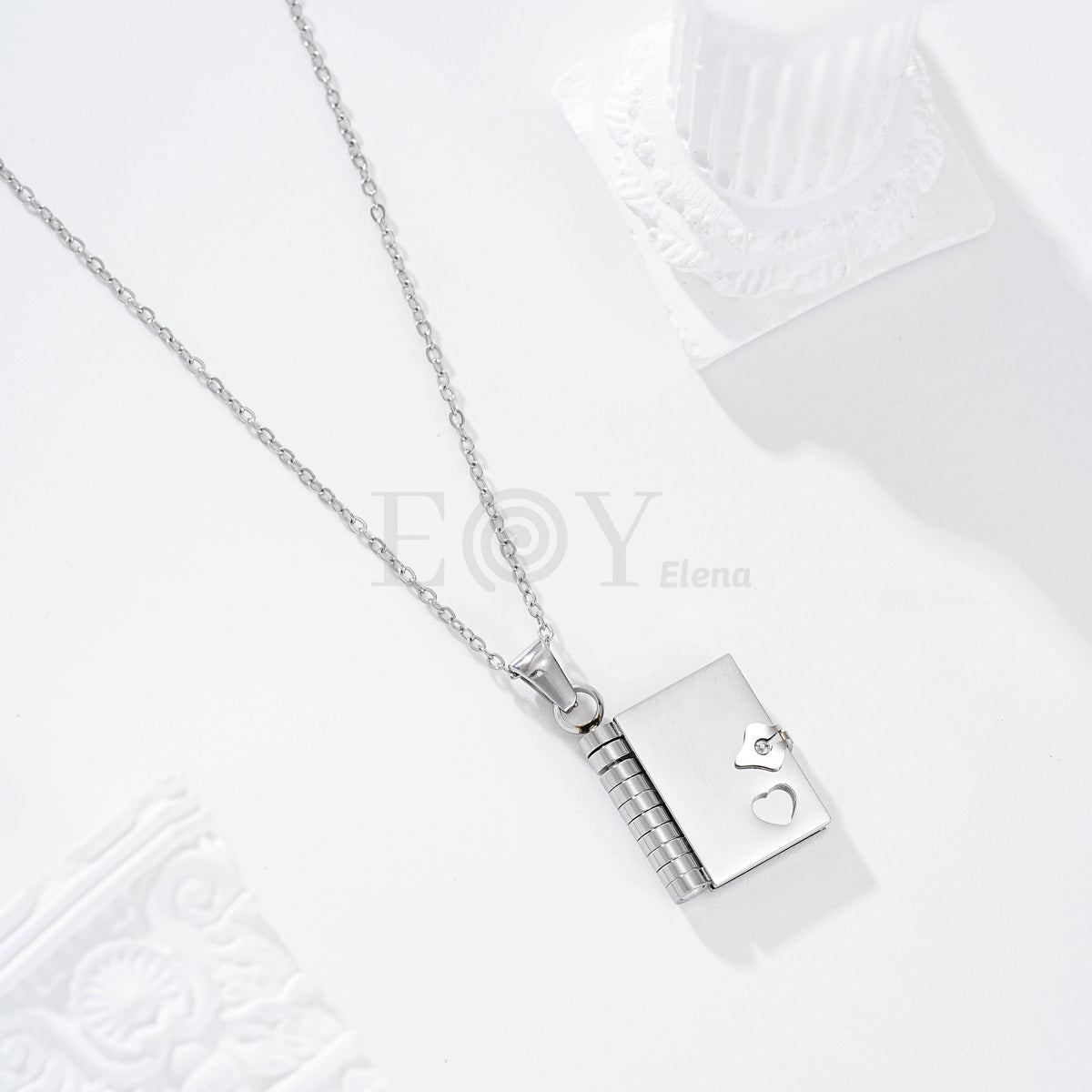 Collar libro acero