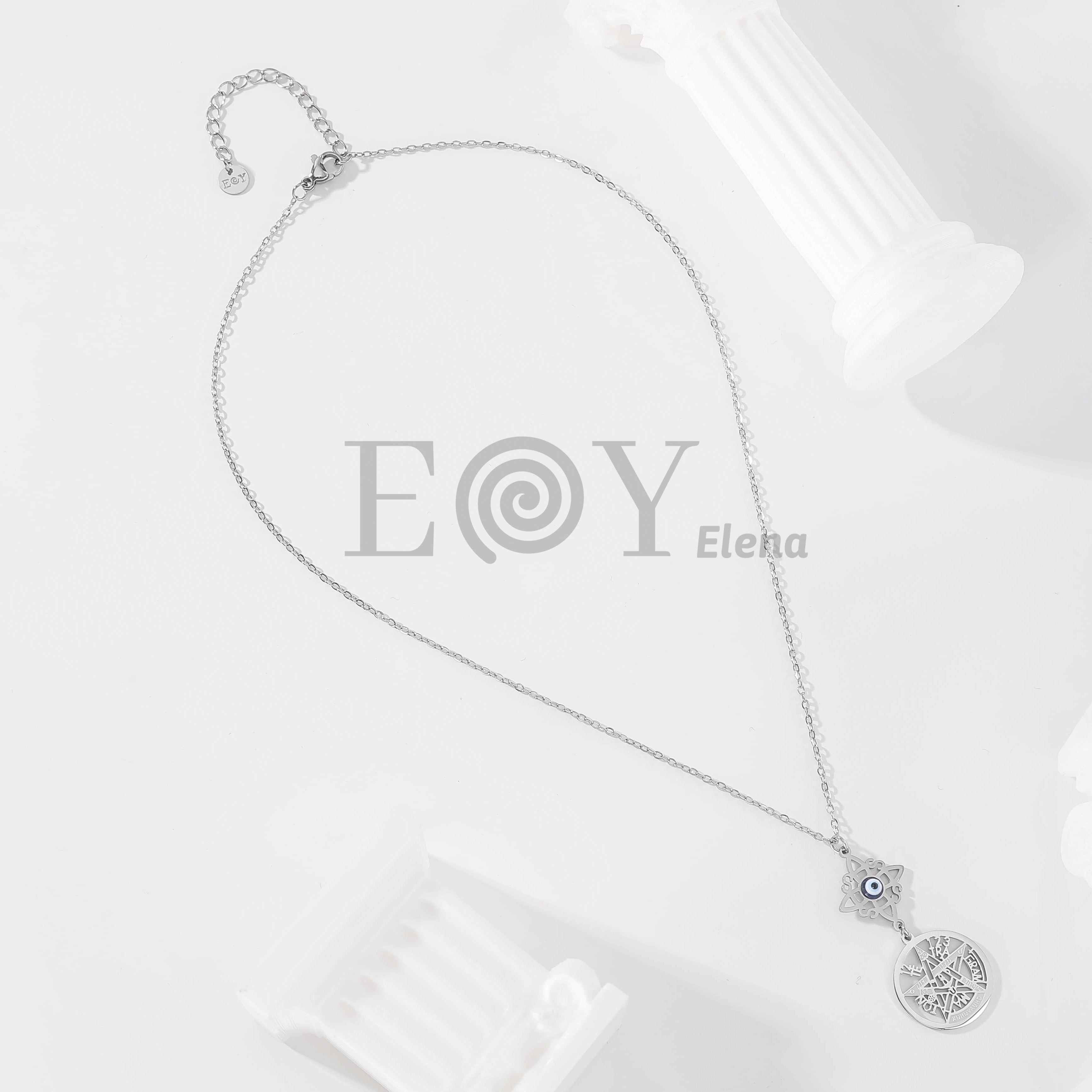 Collar con nudo de bruja y ojo turco + medalla de símbolos