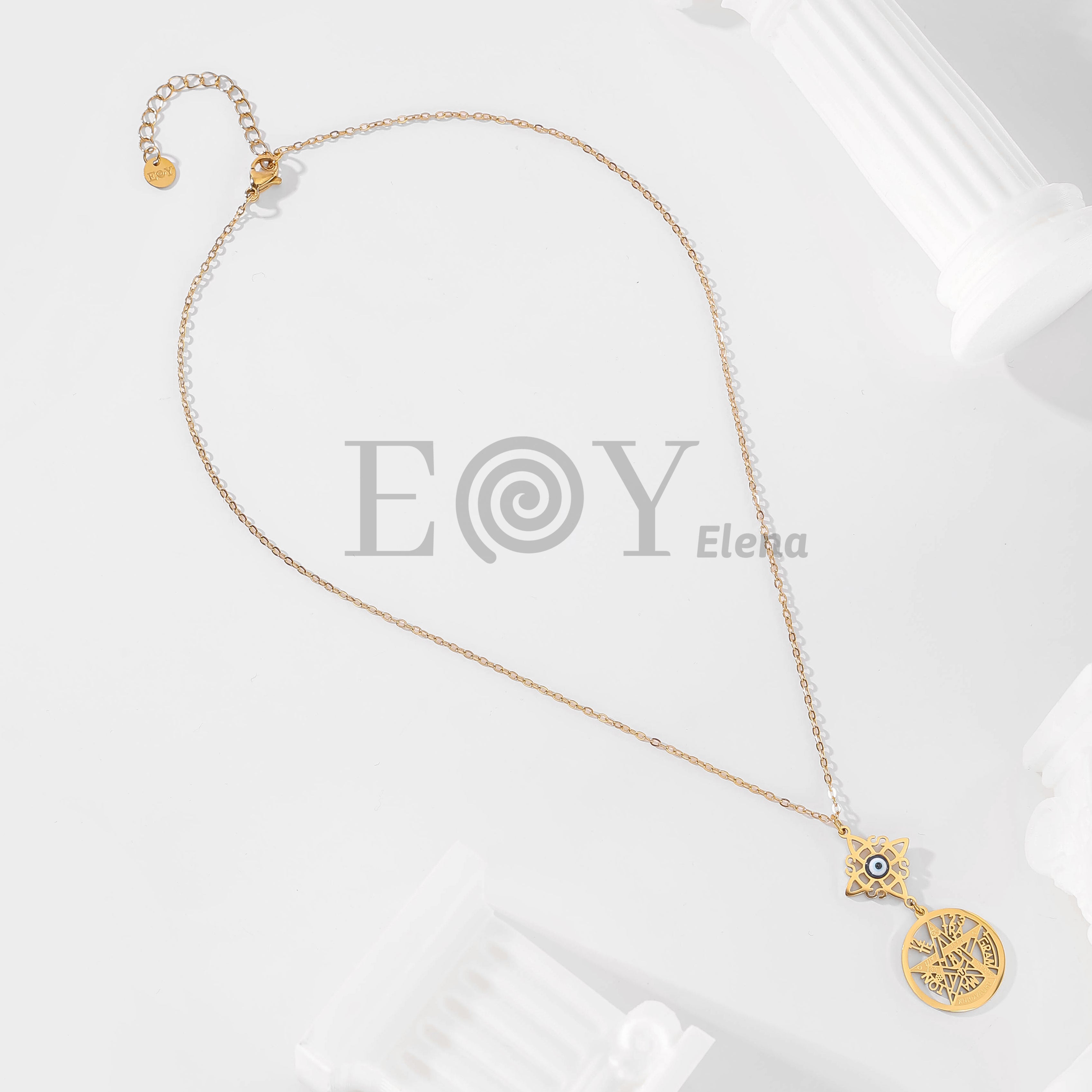 Collar con nudo de bruja y ojo turco + medalla de símbolos