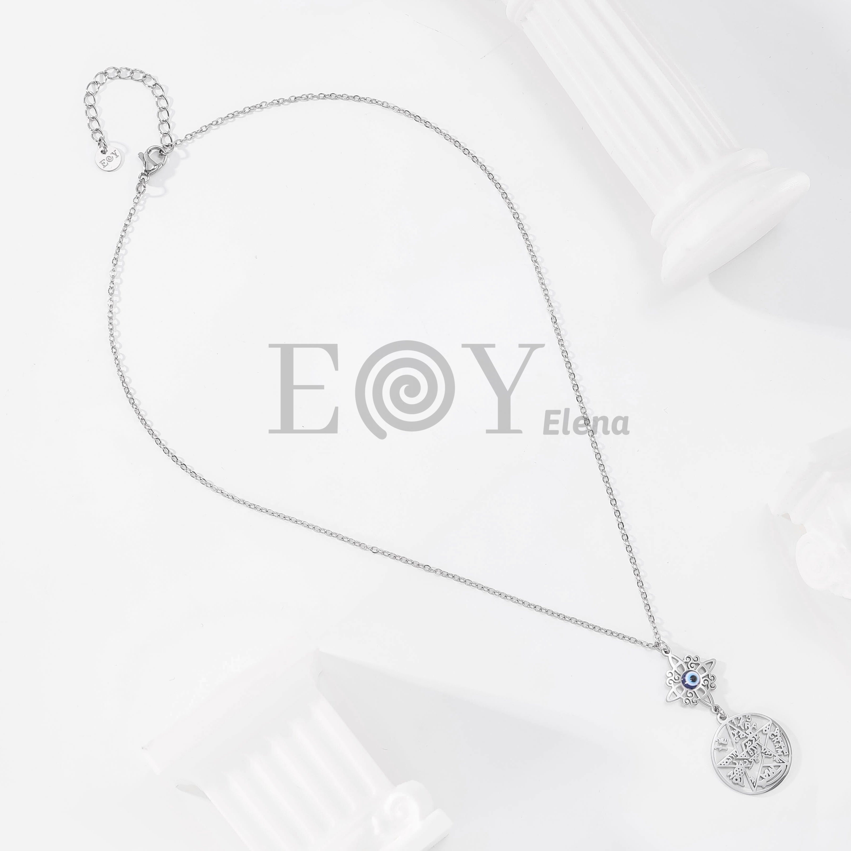 Collar con nudo de bruja y ojo turco + medalla de símbolos