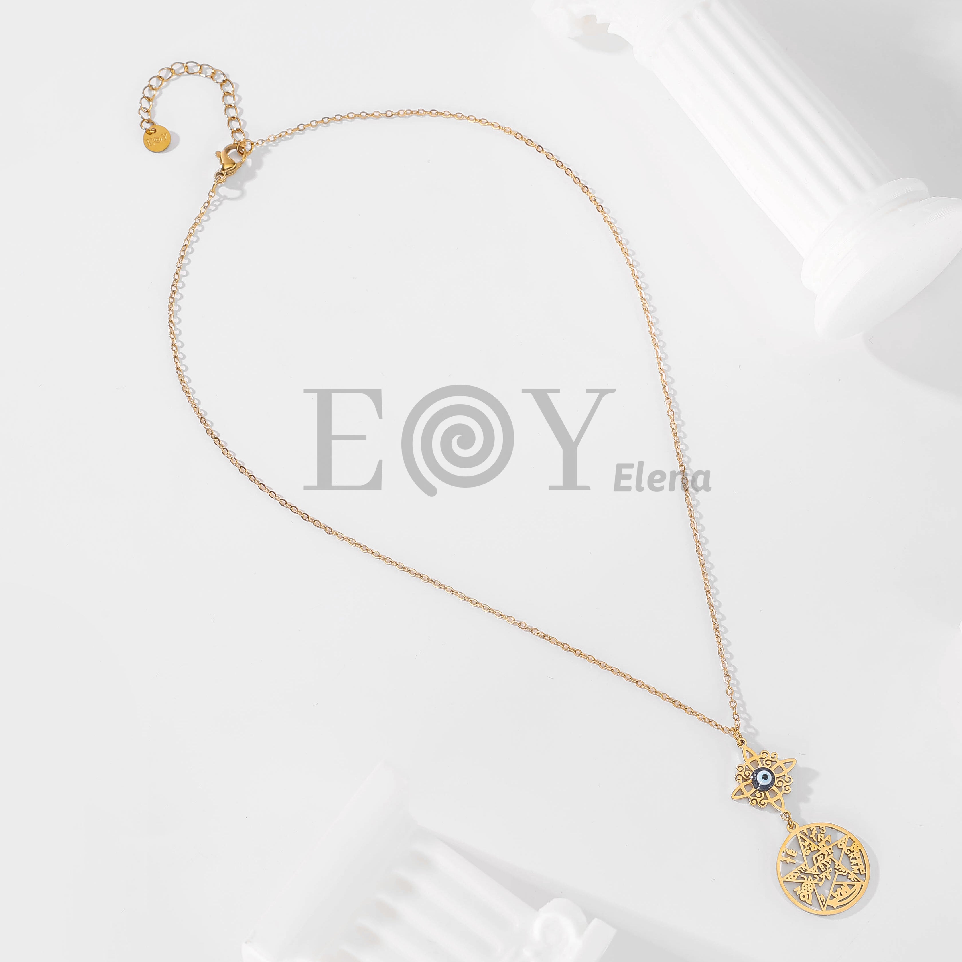 Collar con nudo de bruja y ojo turco + medalla de símbolos