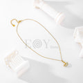 Collar dorado con colgante de barco