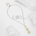 Collar con colgantes de nudo de bruja, medalla y mandala