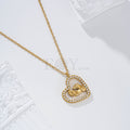Collar corazón circonitas y pies acero