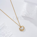 Collar corazón ala circonitas acero