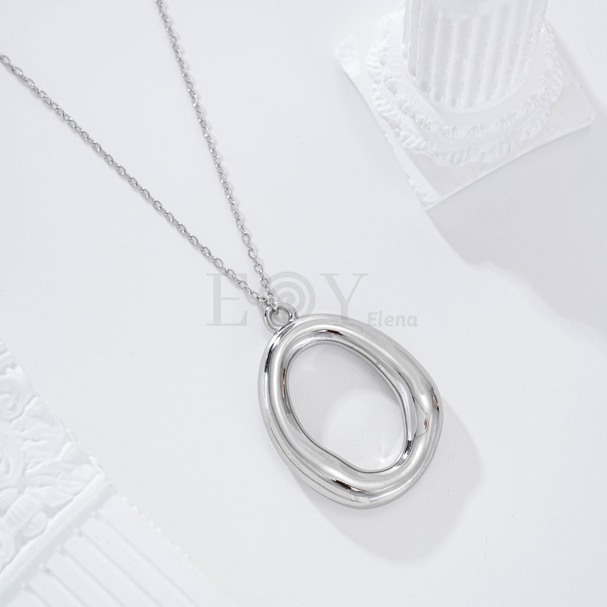 Collar óvalo central hueco acero
