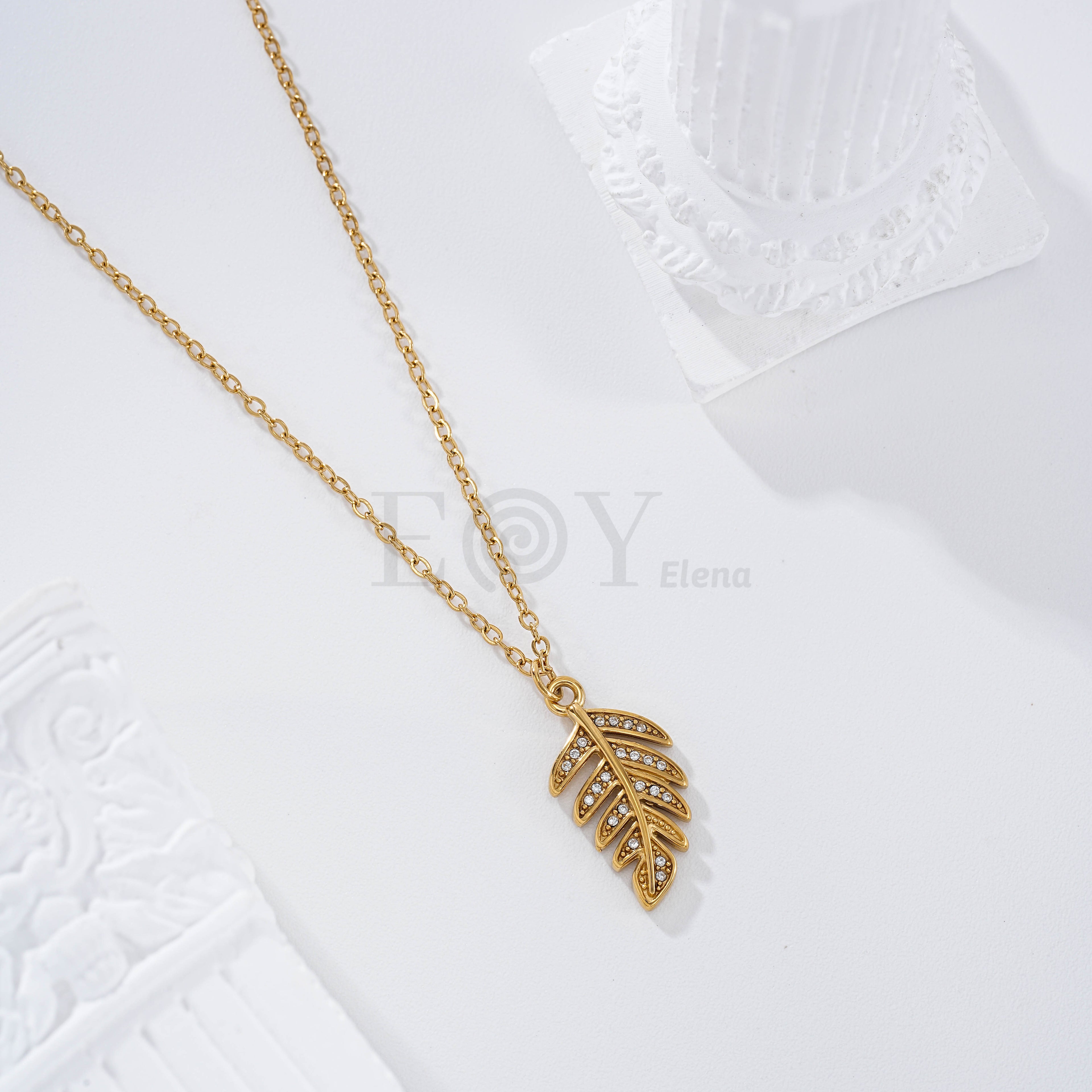 Collar hoja circonitas acero