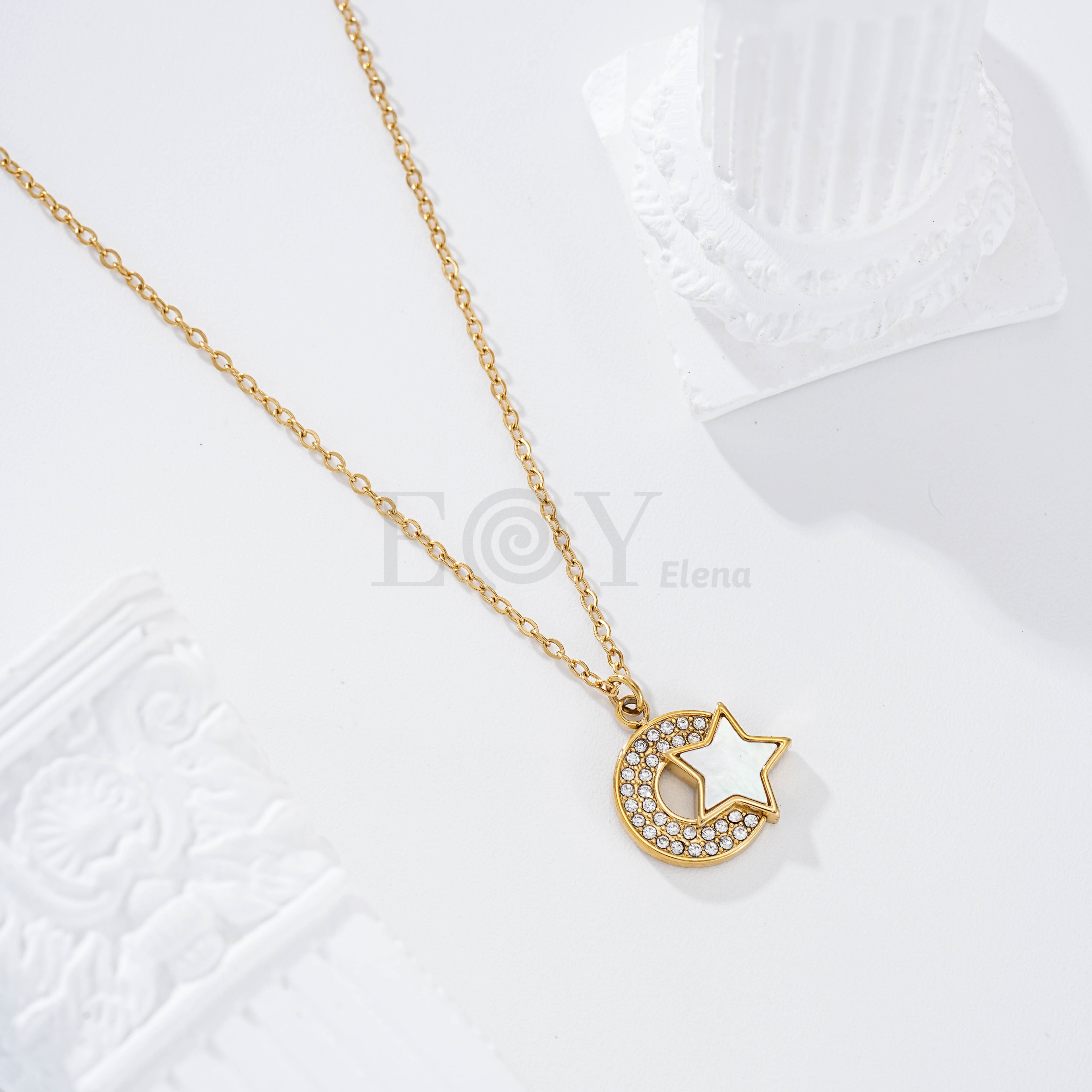 Collar luna circonitas y estrella nacar acero
