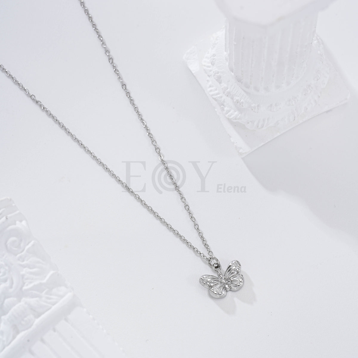 Collar mariposa acero