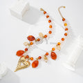 Collar de piedras con charm de corazón