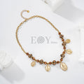 Collar de acero con bolitas y charms de vírgenes