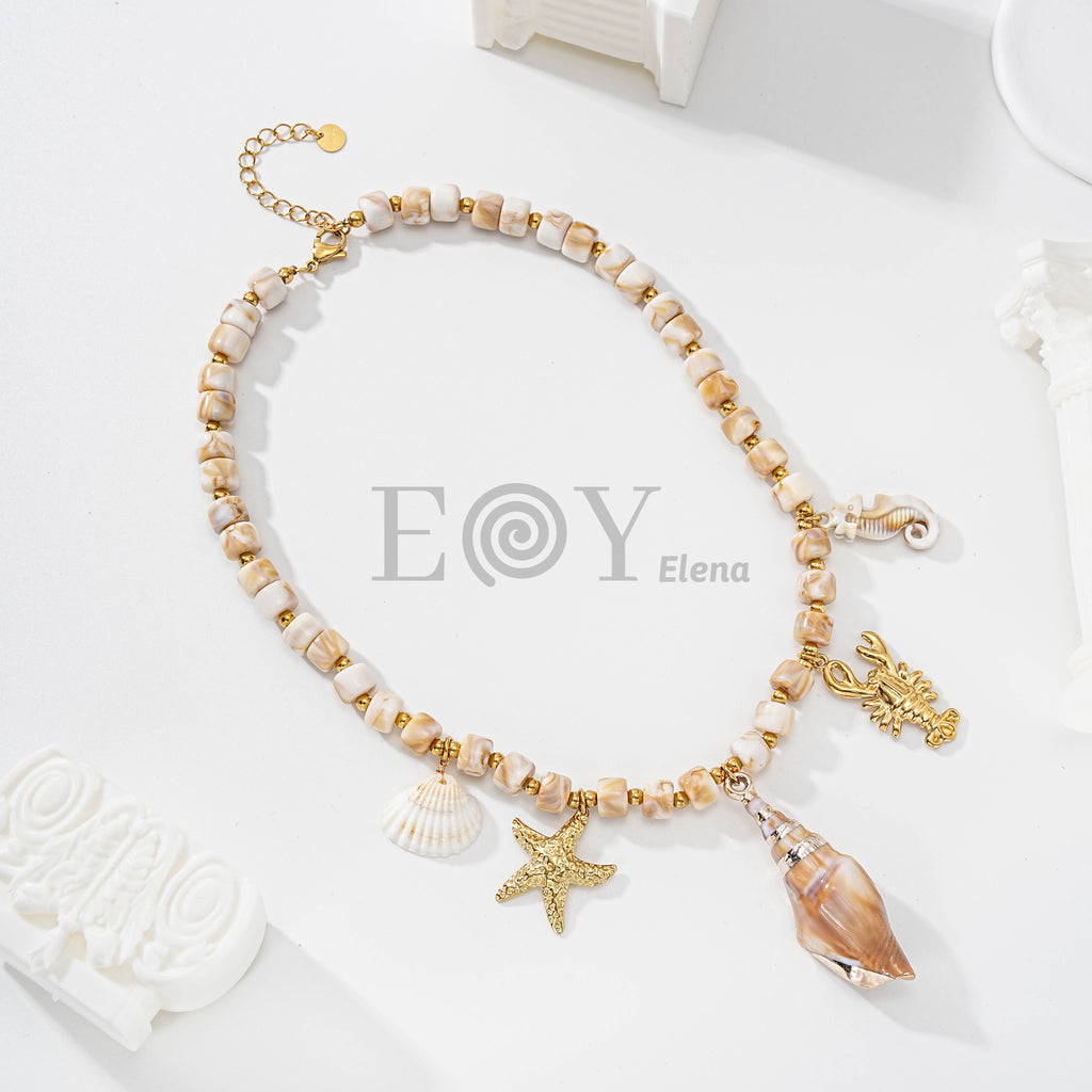 Collar de bolitas y charms marinos
