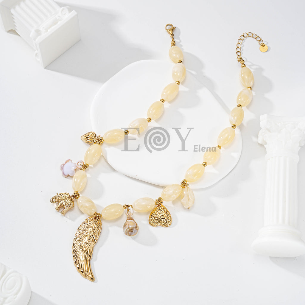 Collar de piedras y charms con ala central