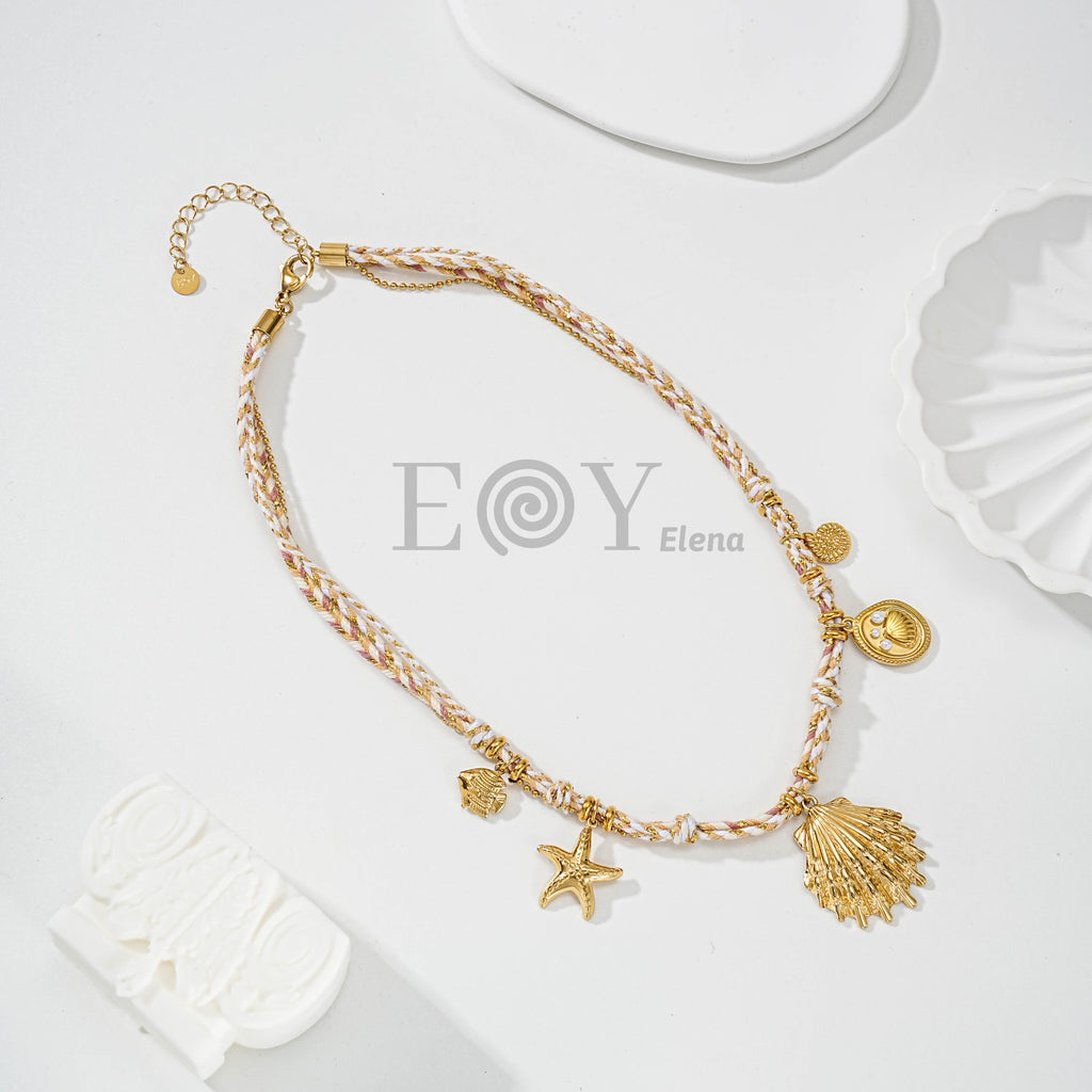 Collar de cadena y cuerda con concha central y motivos de mar