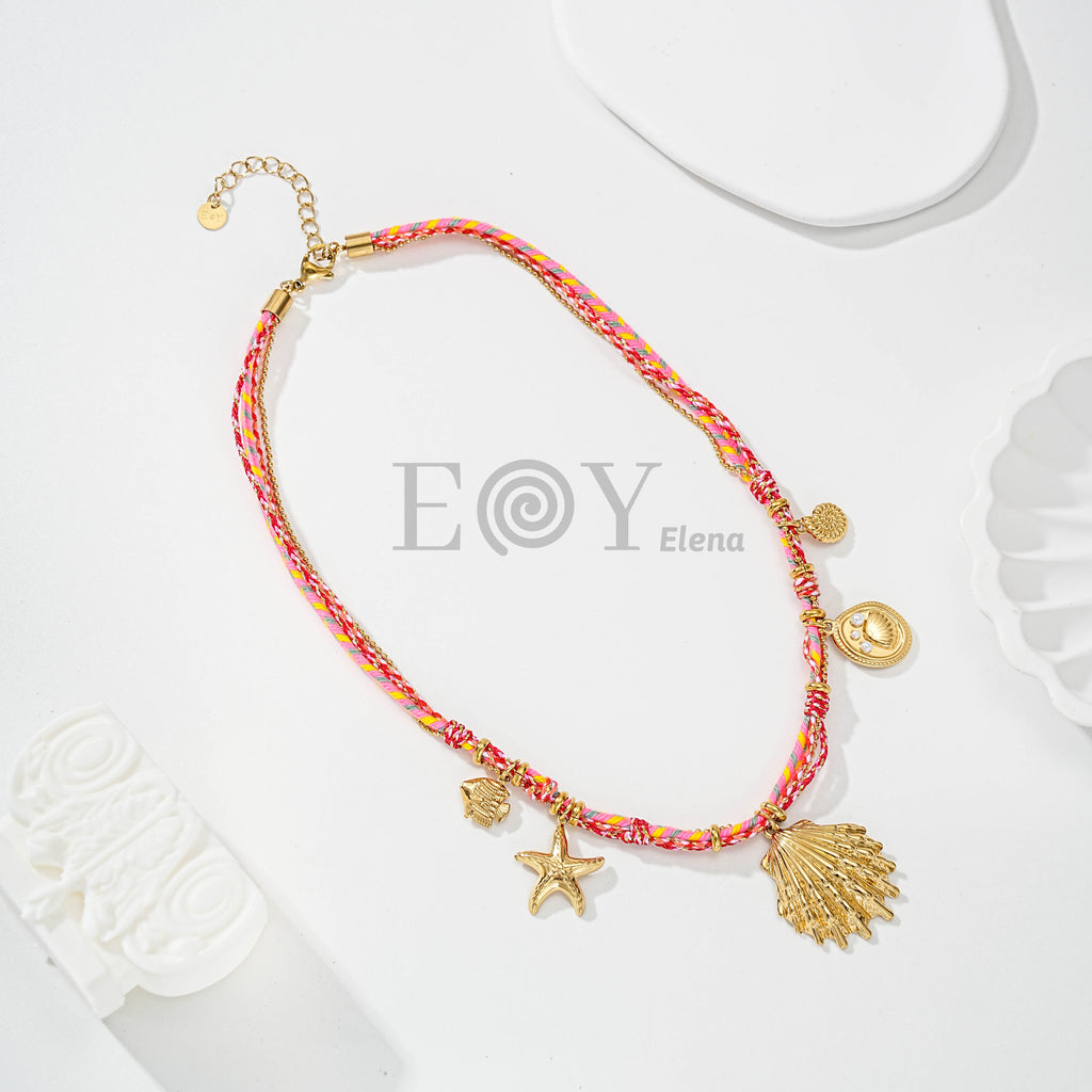 Collar de cadena y cuerda con concha central y motivos de mar