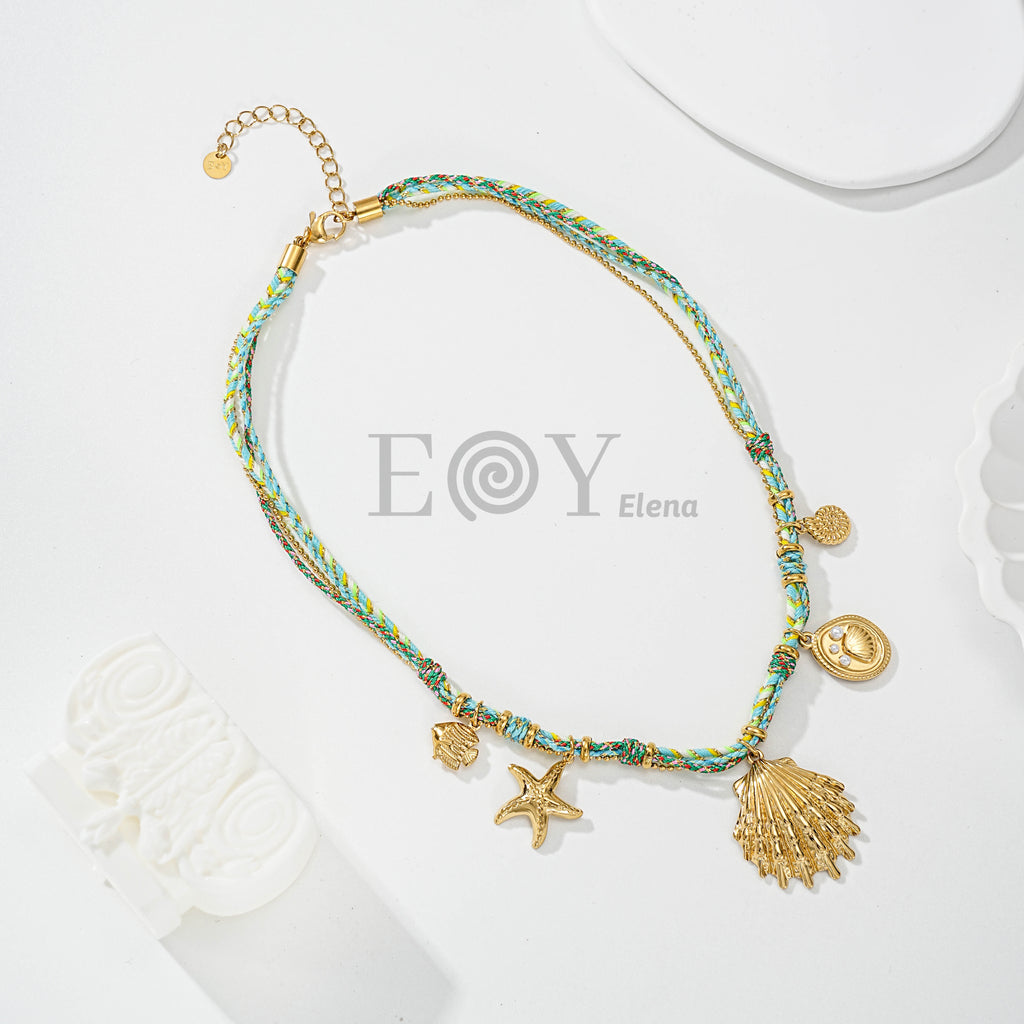 Collar de cadena y cuerda con concha central y motivos de mar