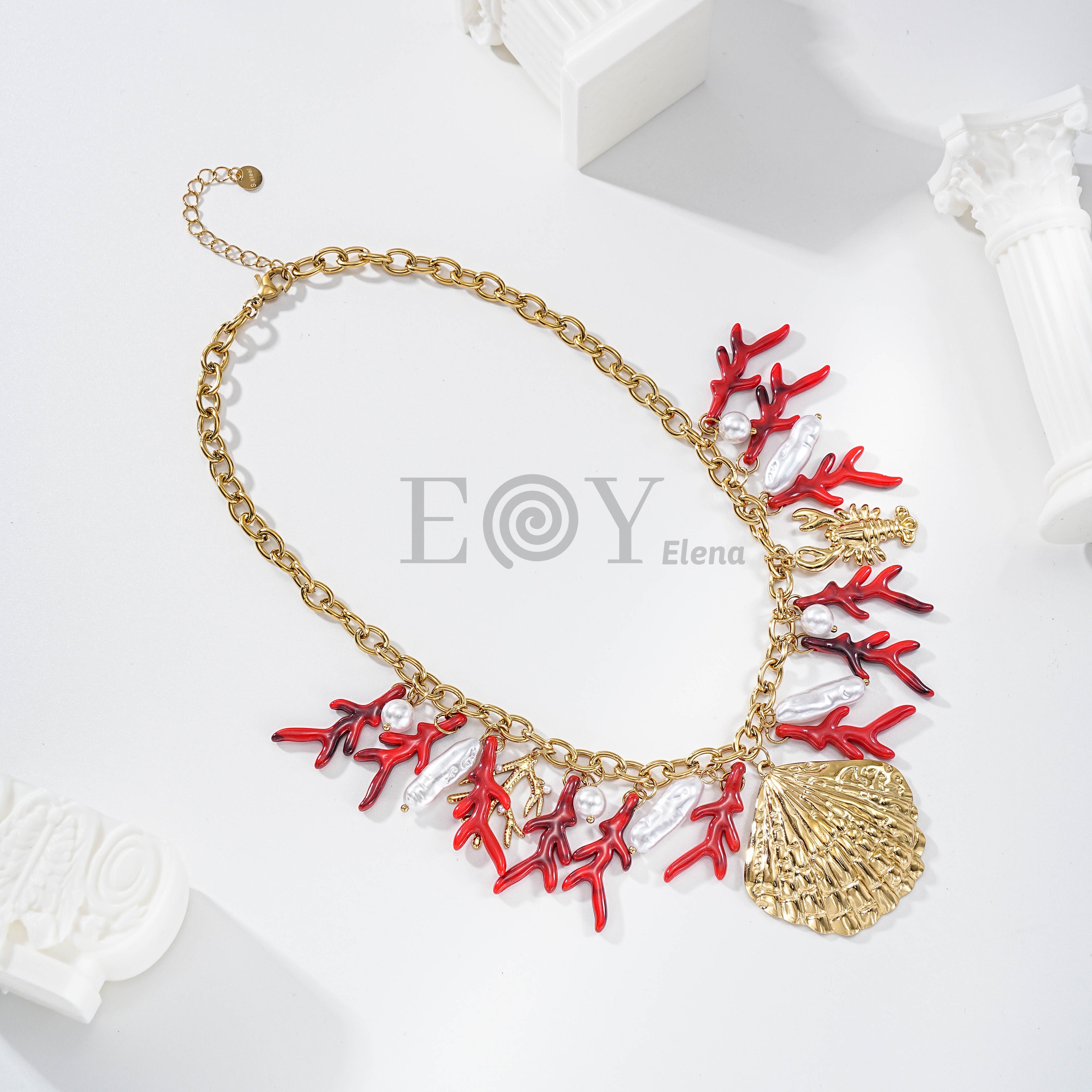 Collar coral de resina y acero con concha central