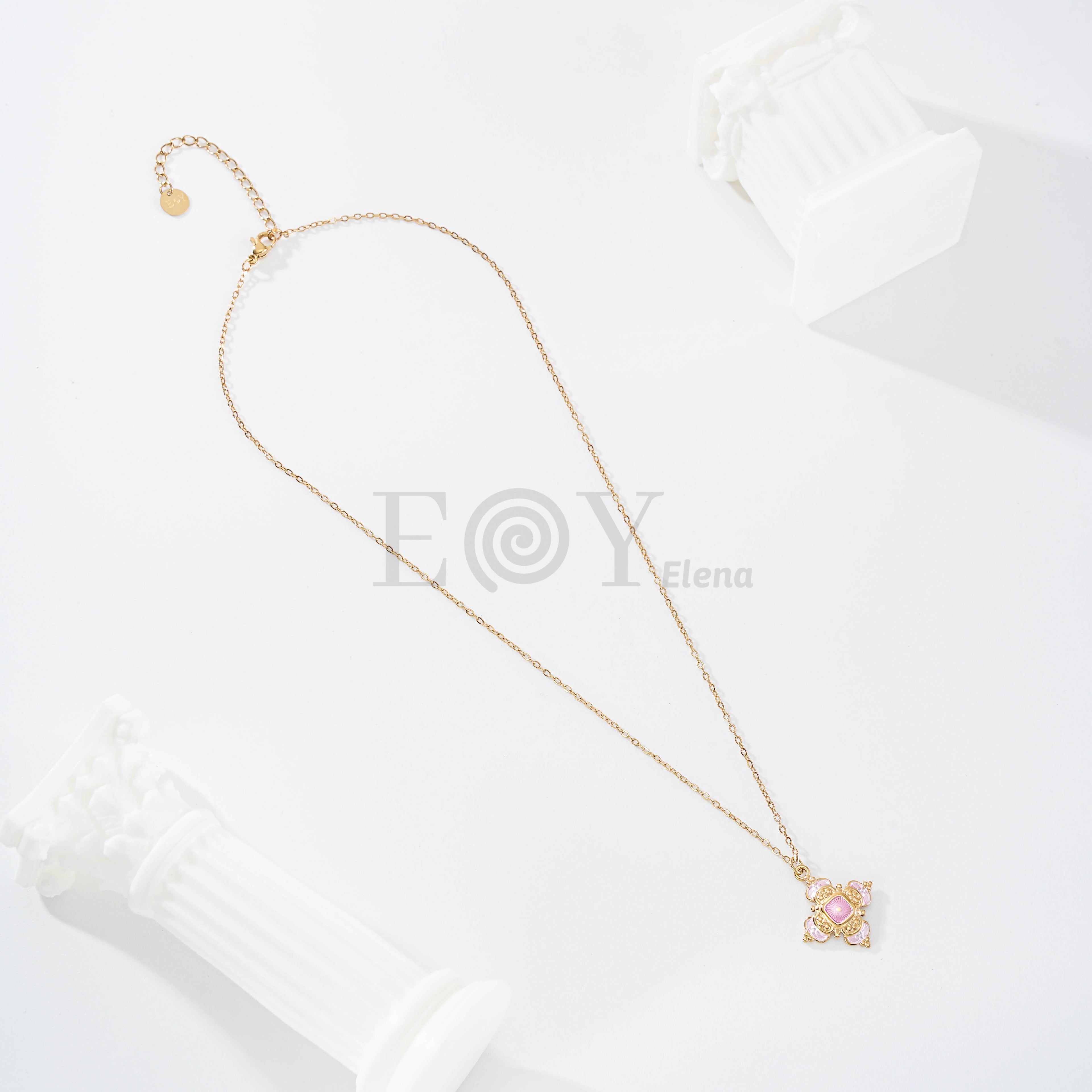 Collar cruz con piedra