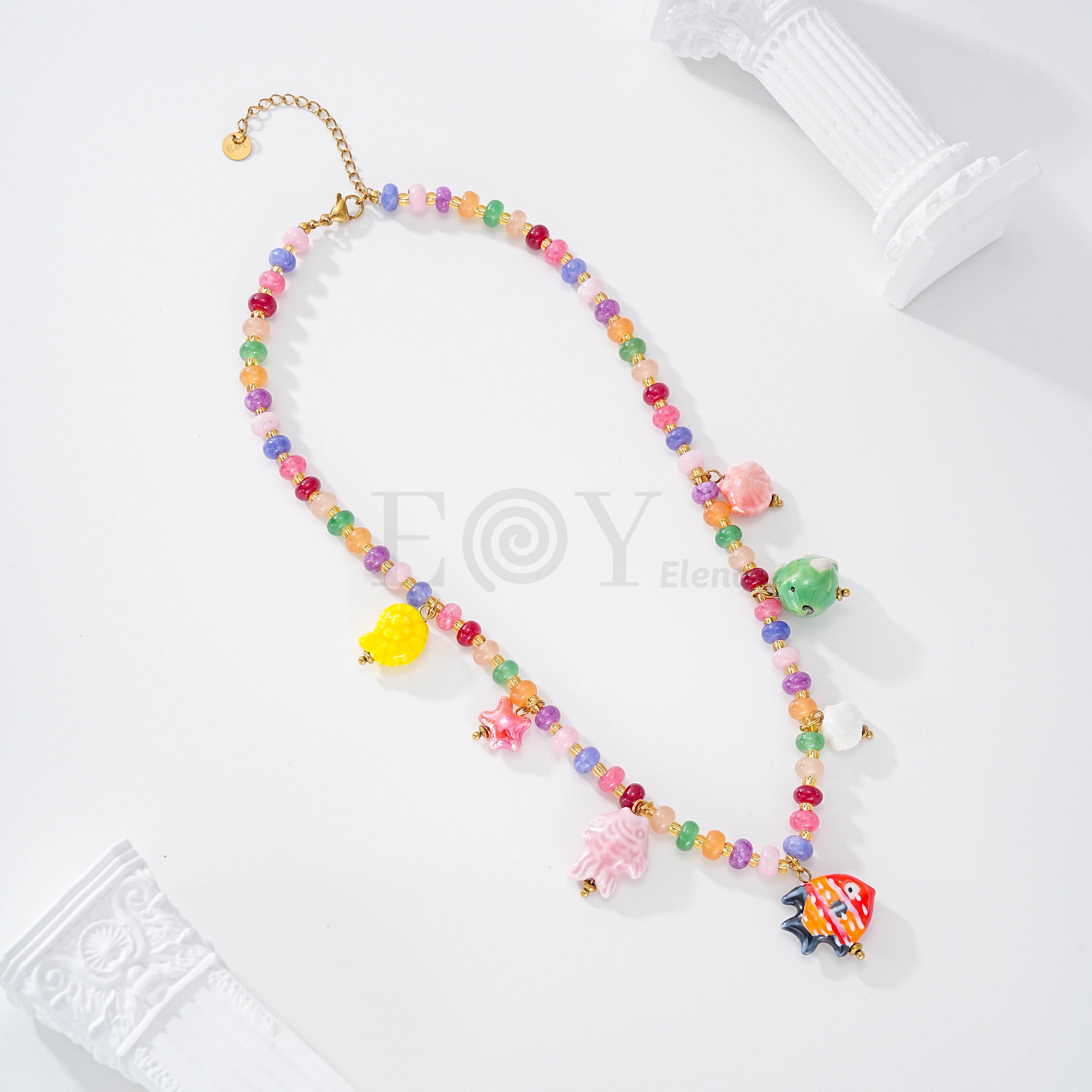 Collar cadena bolas y charms peces y mar acero