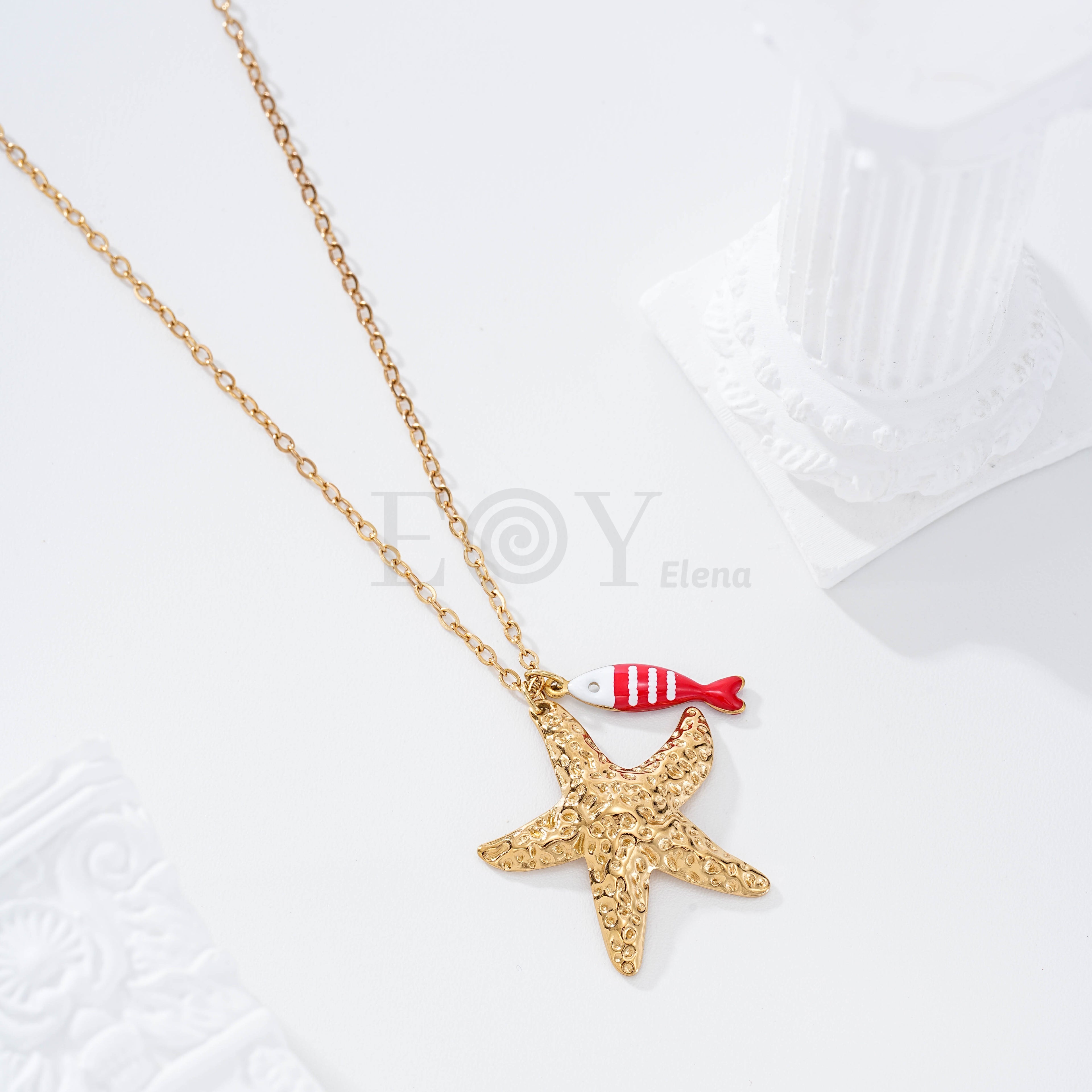 Collar pez rayas y estrella dorada