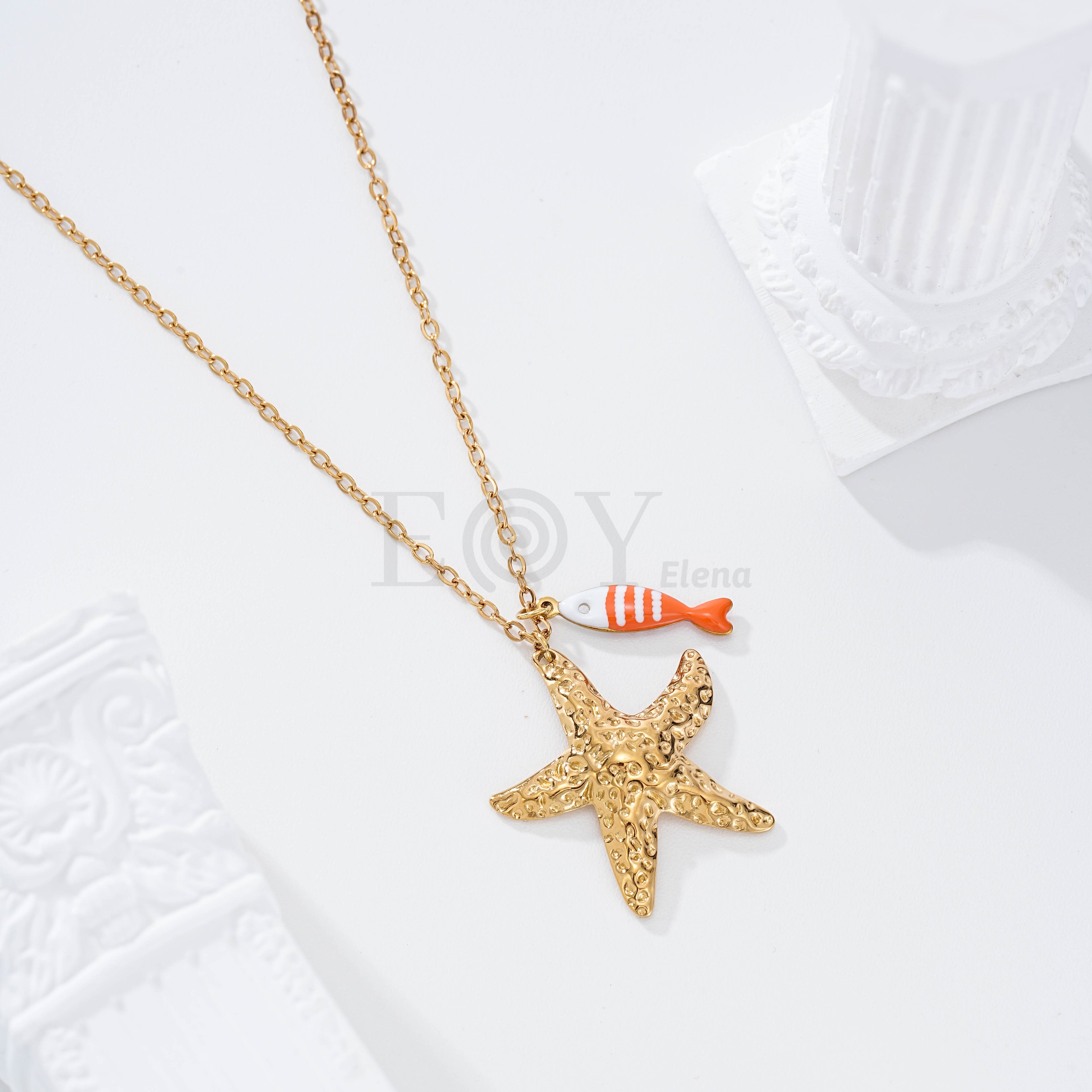 Collar pez rayas y estrella dorada