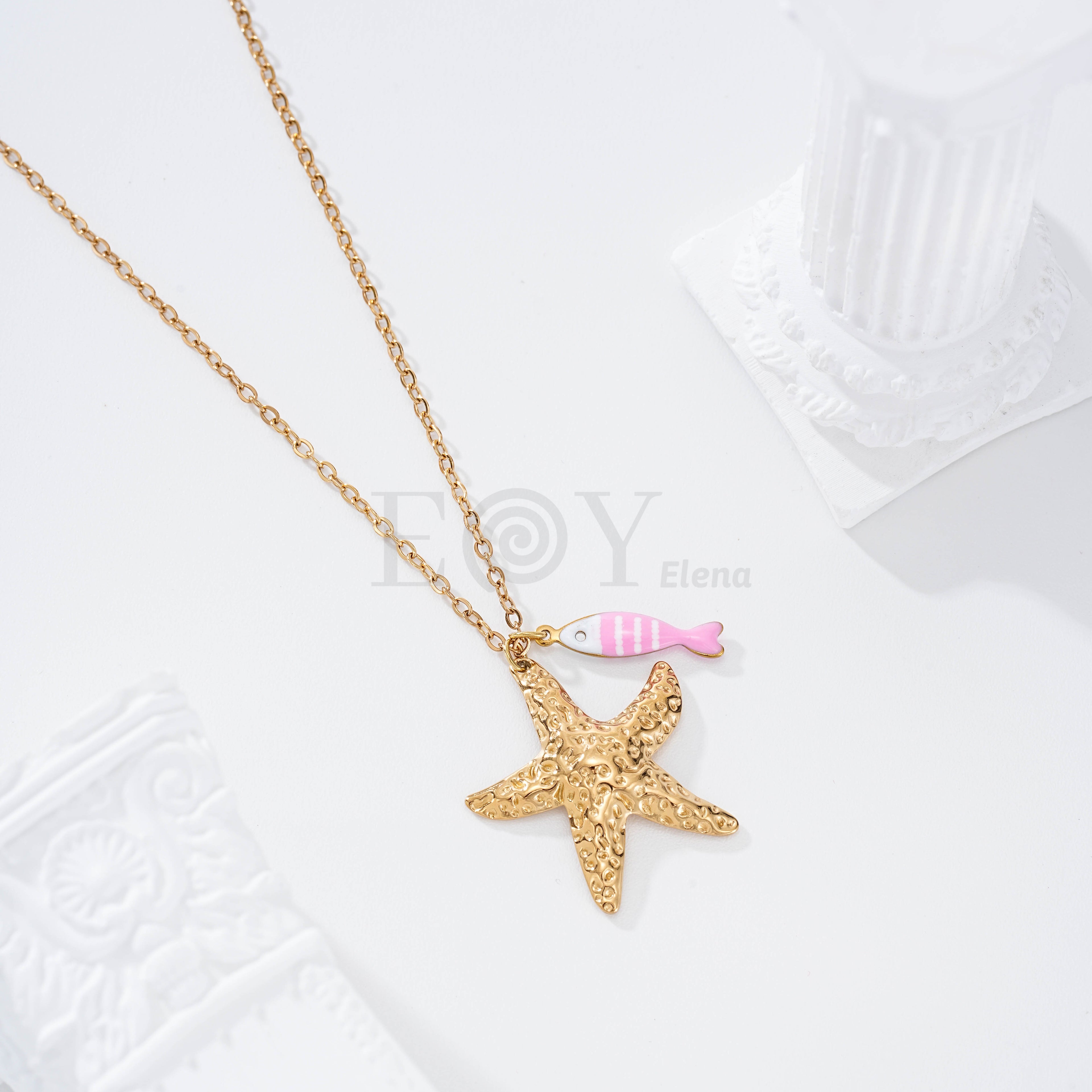 Collar pez rayas y estrella dorada