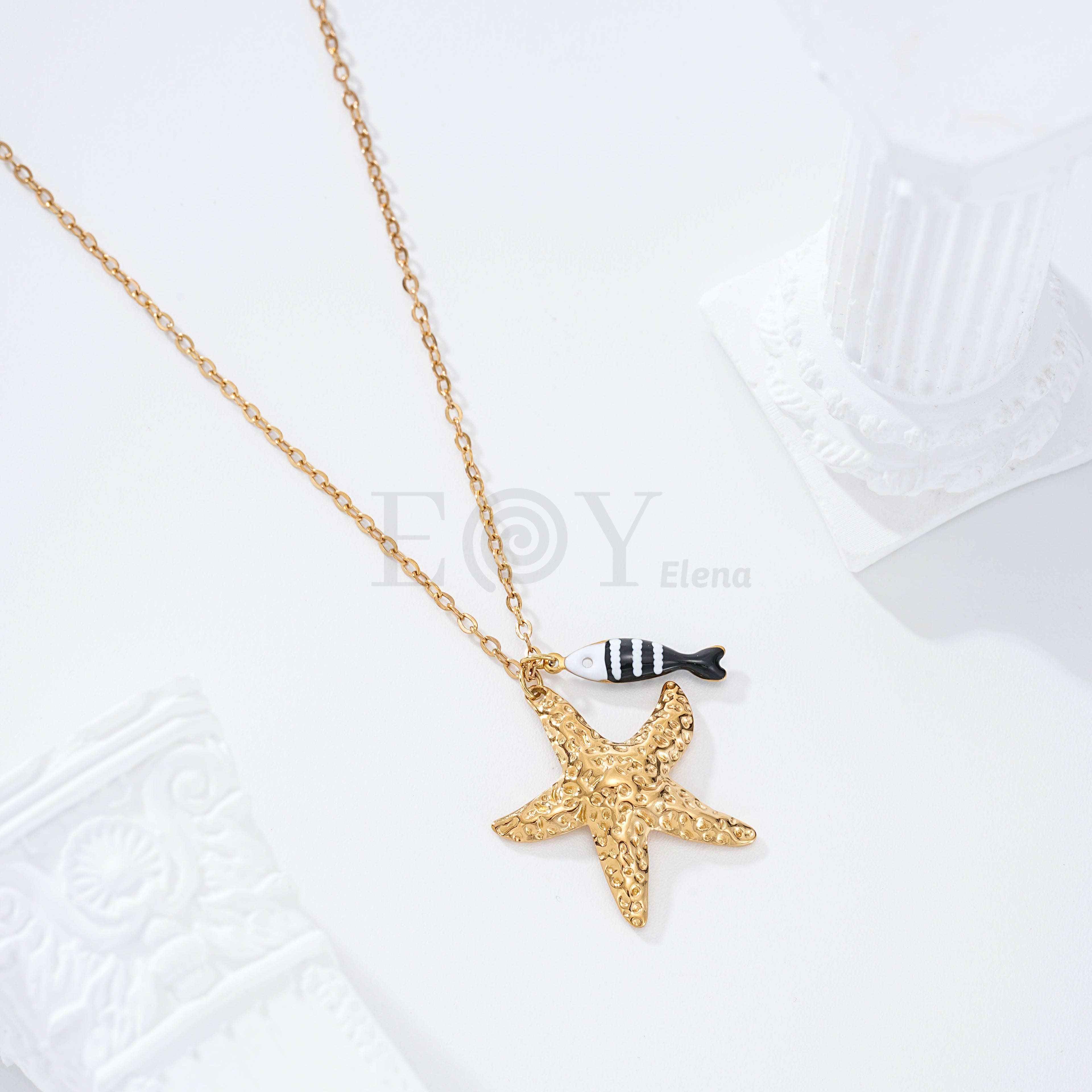 Collar pez rayas y estrella dorada