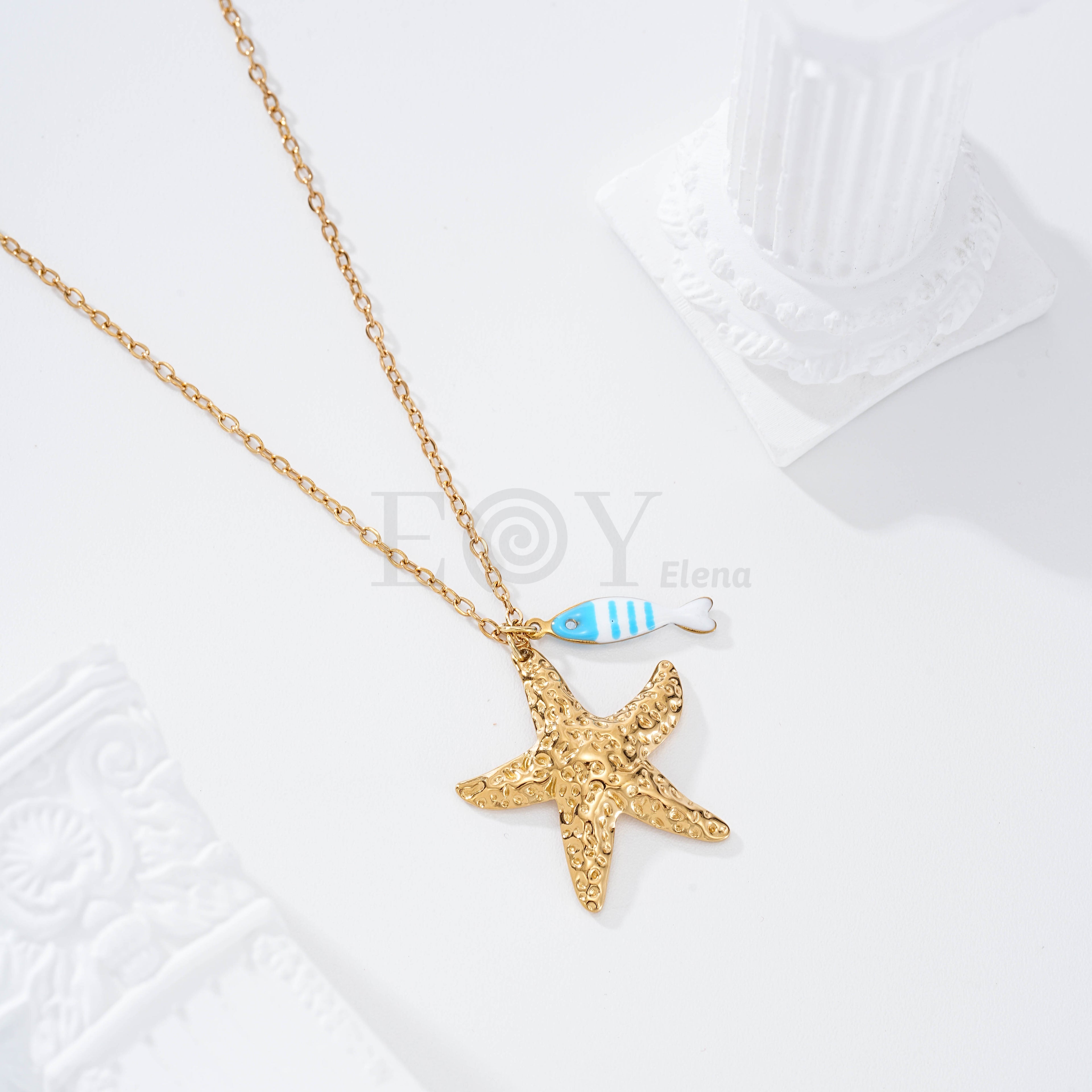 Collar pez rayas y estrella dorada