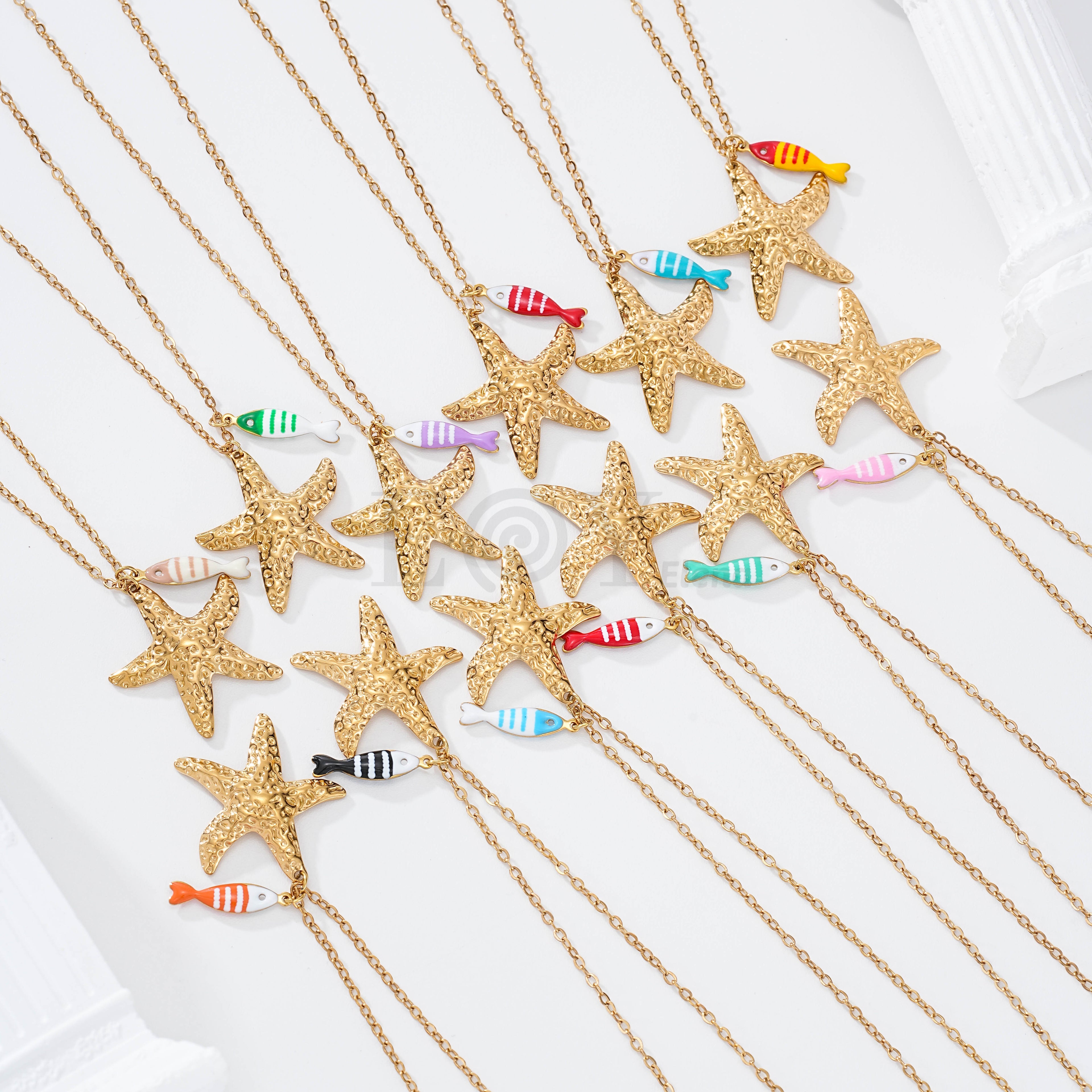 Collar pez rayas y estrella dorada