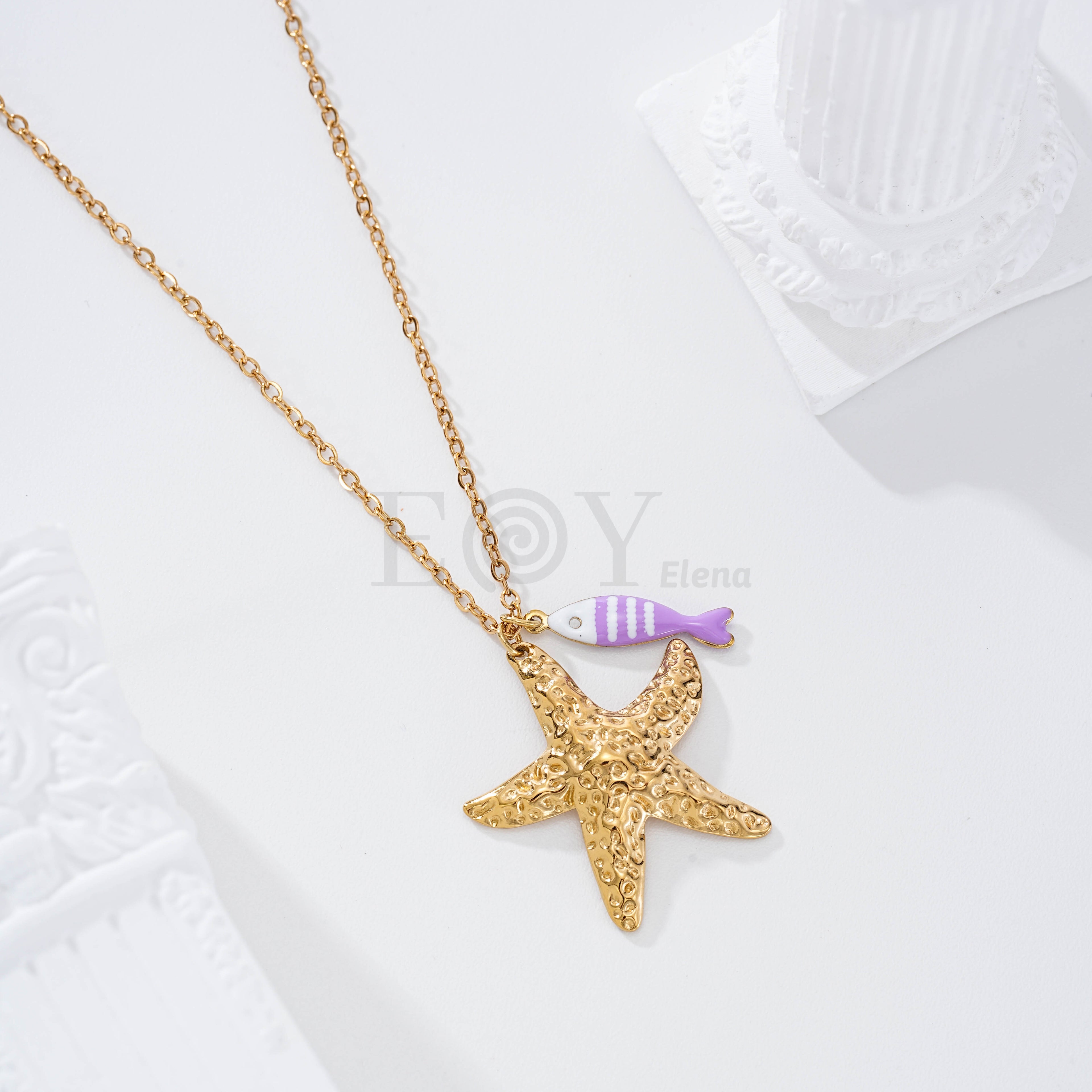 Collar pez rayas y estrella dorada