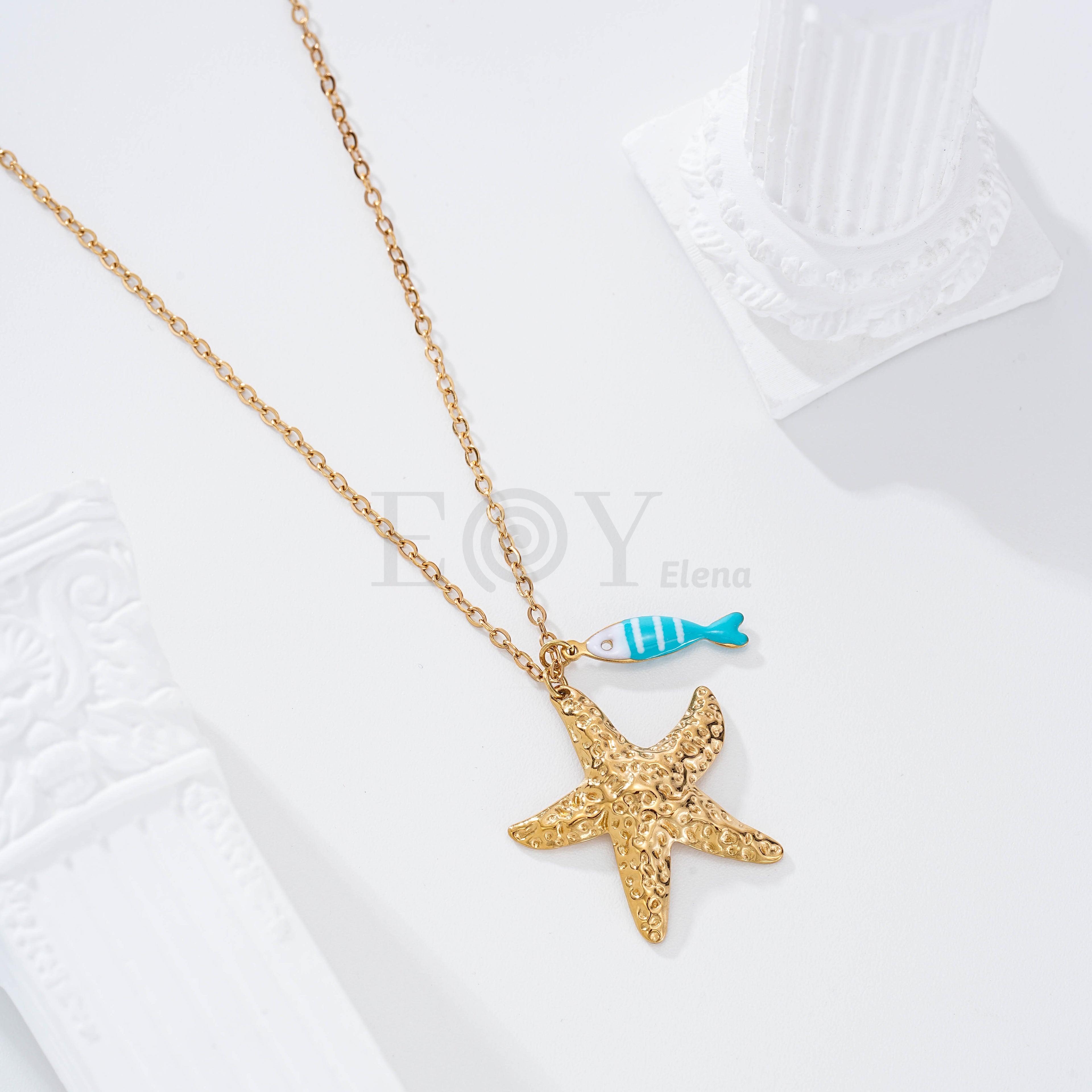 Collar pez rayas y estrella dorada
